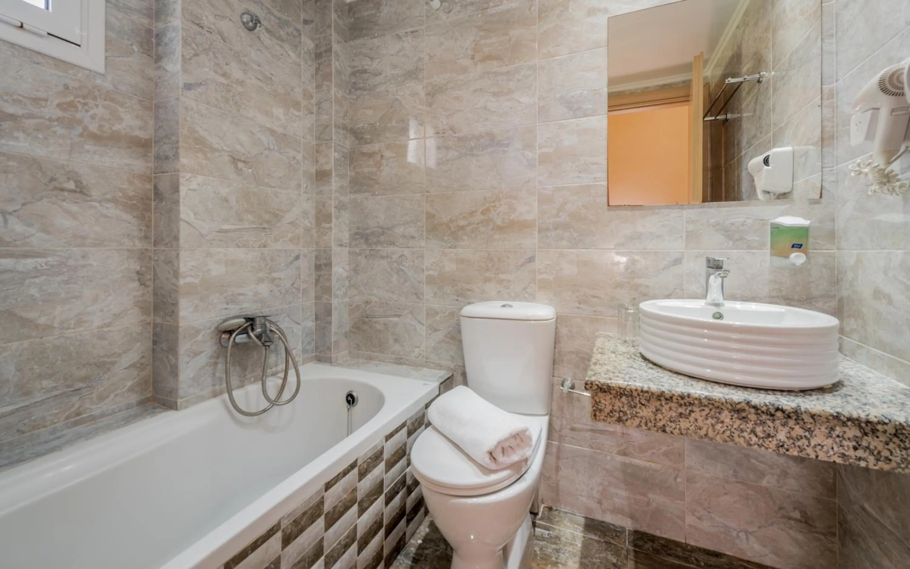 Toilet in Dennys Inn Hotel