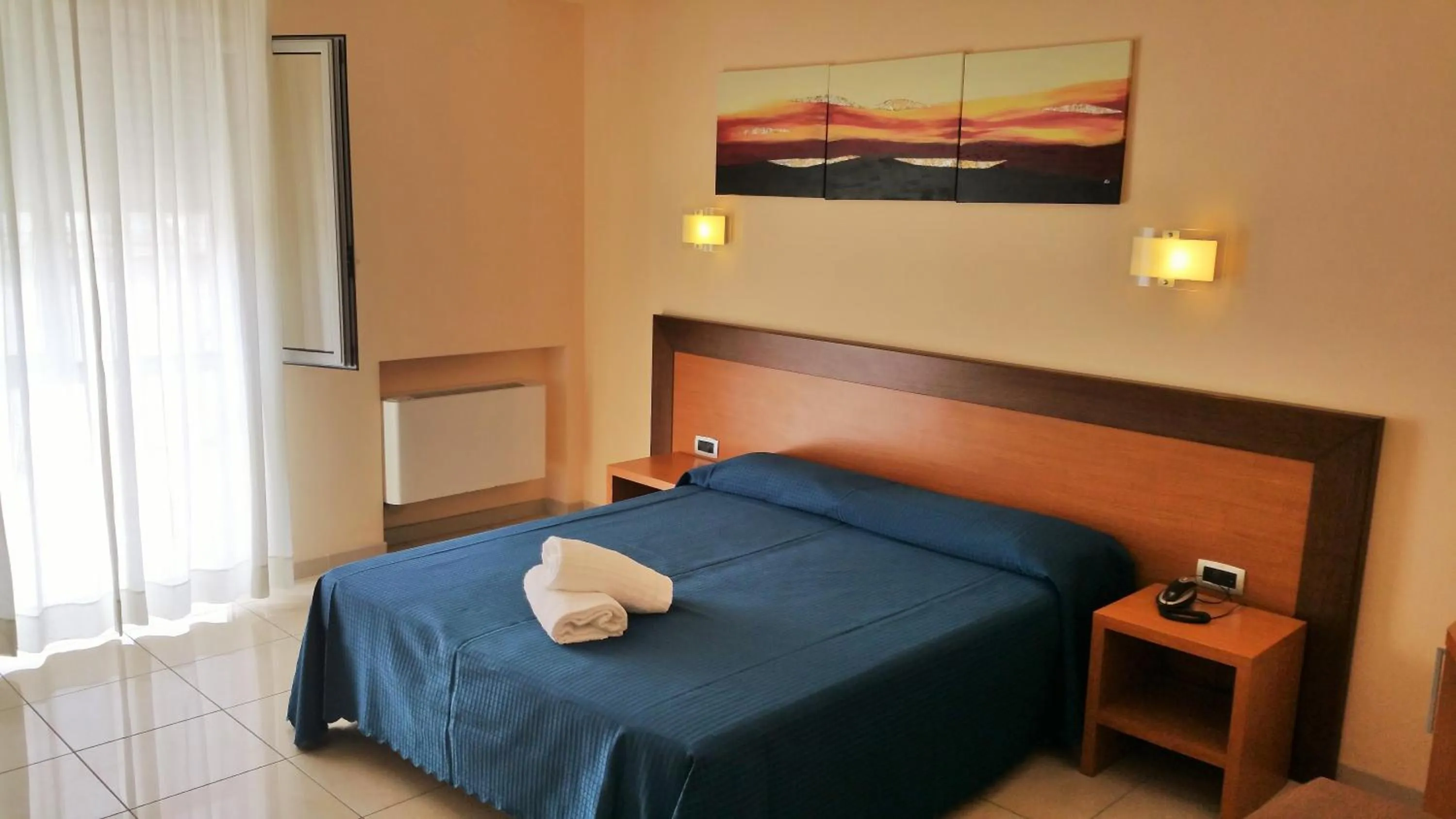 Bedroom in Hotel Club Koiné