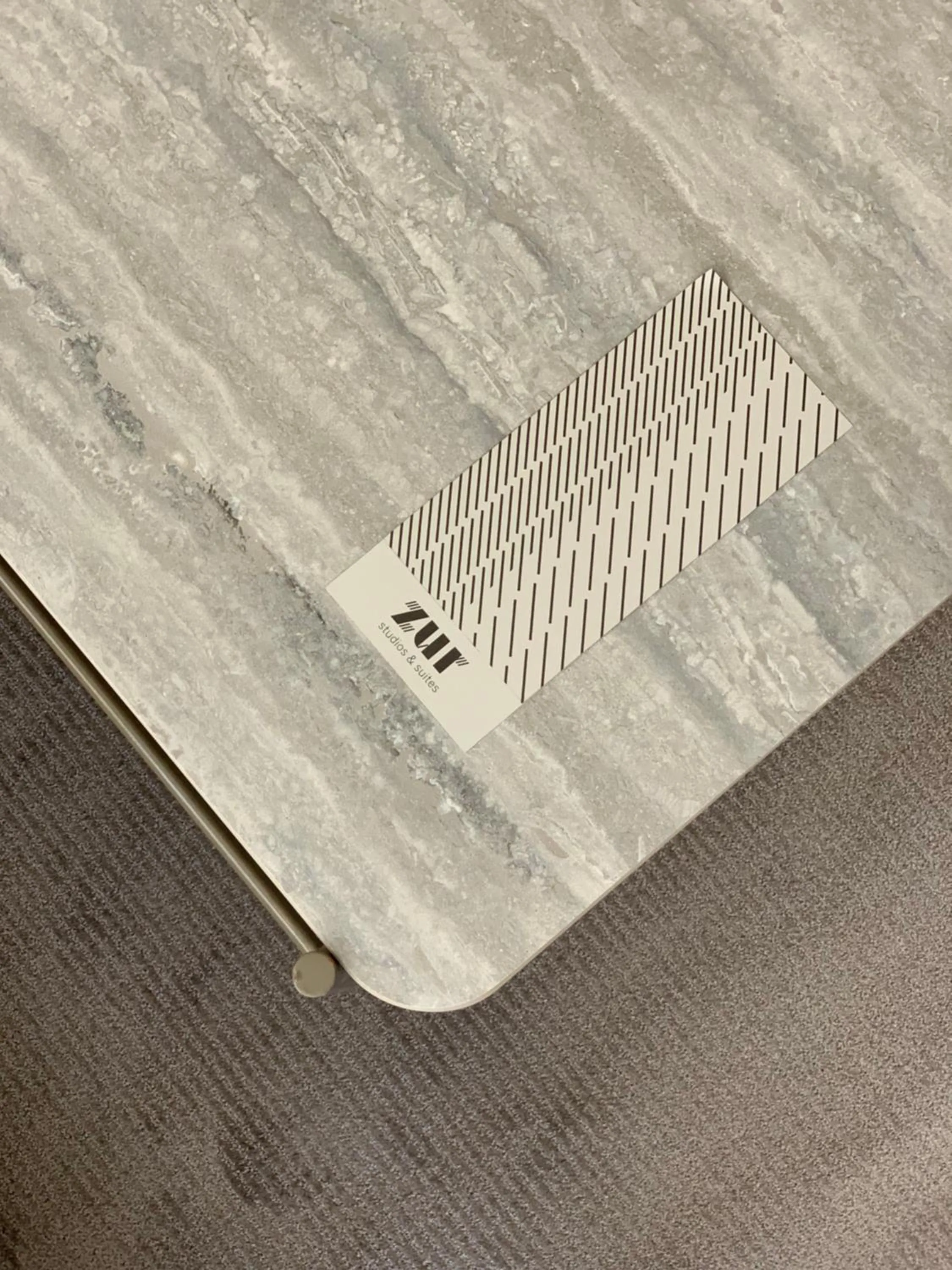 Property logo or sign in ZUR Studios and Suites