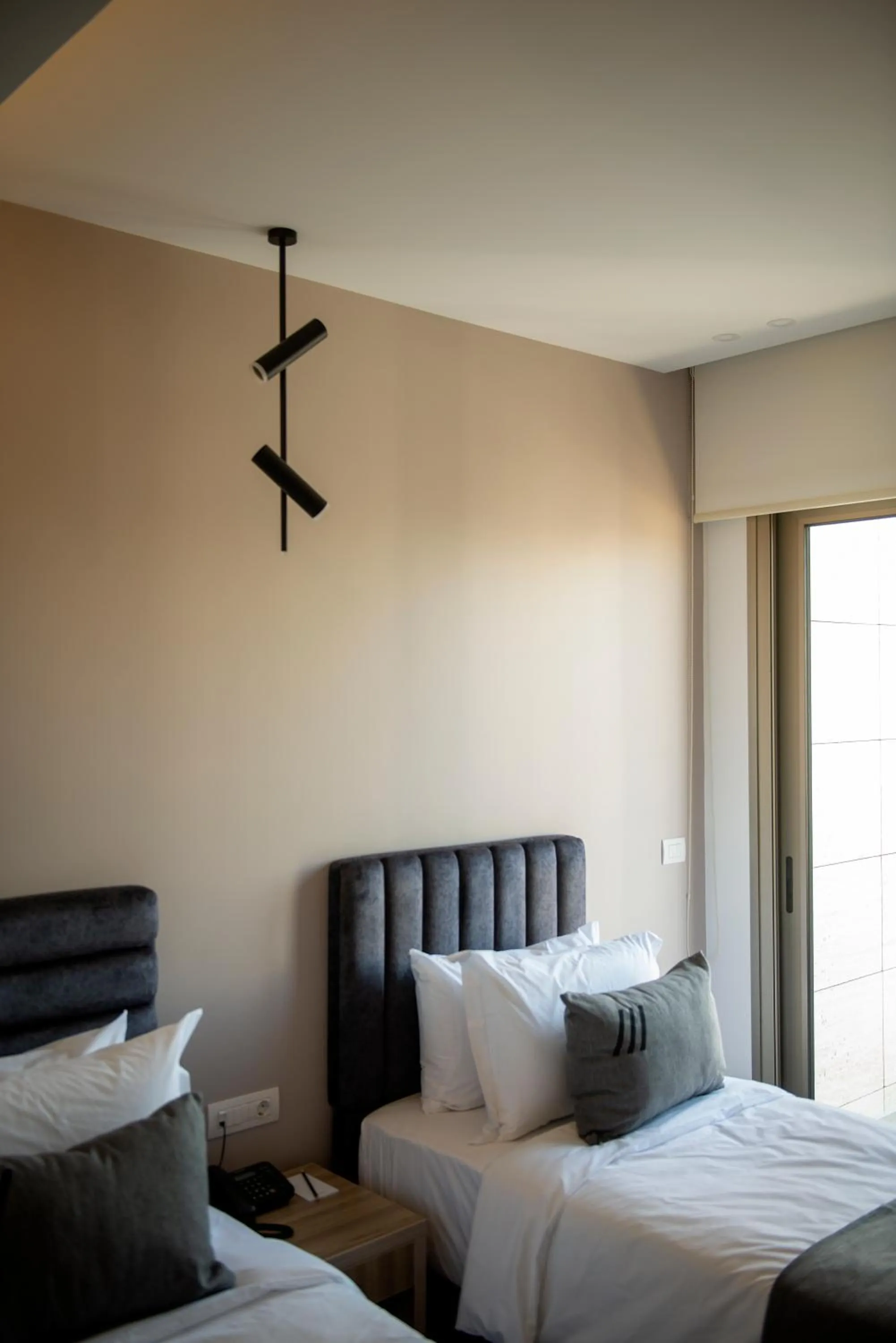 Bed in ZUR Studios and Suites