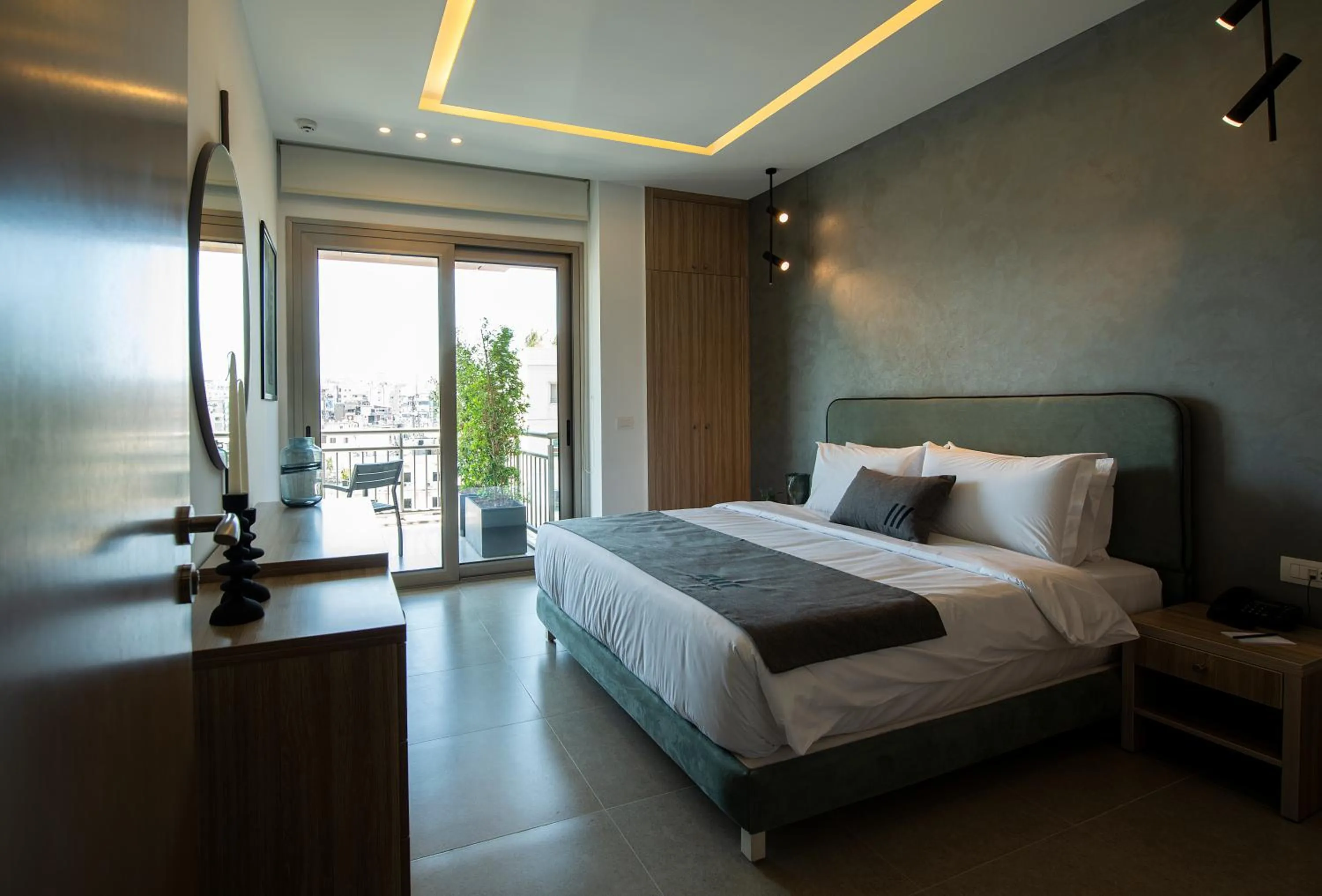 Bed in ZUR Studios and Suites