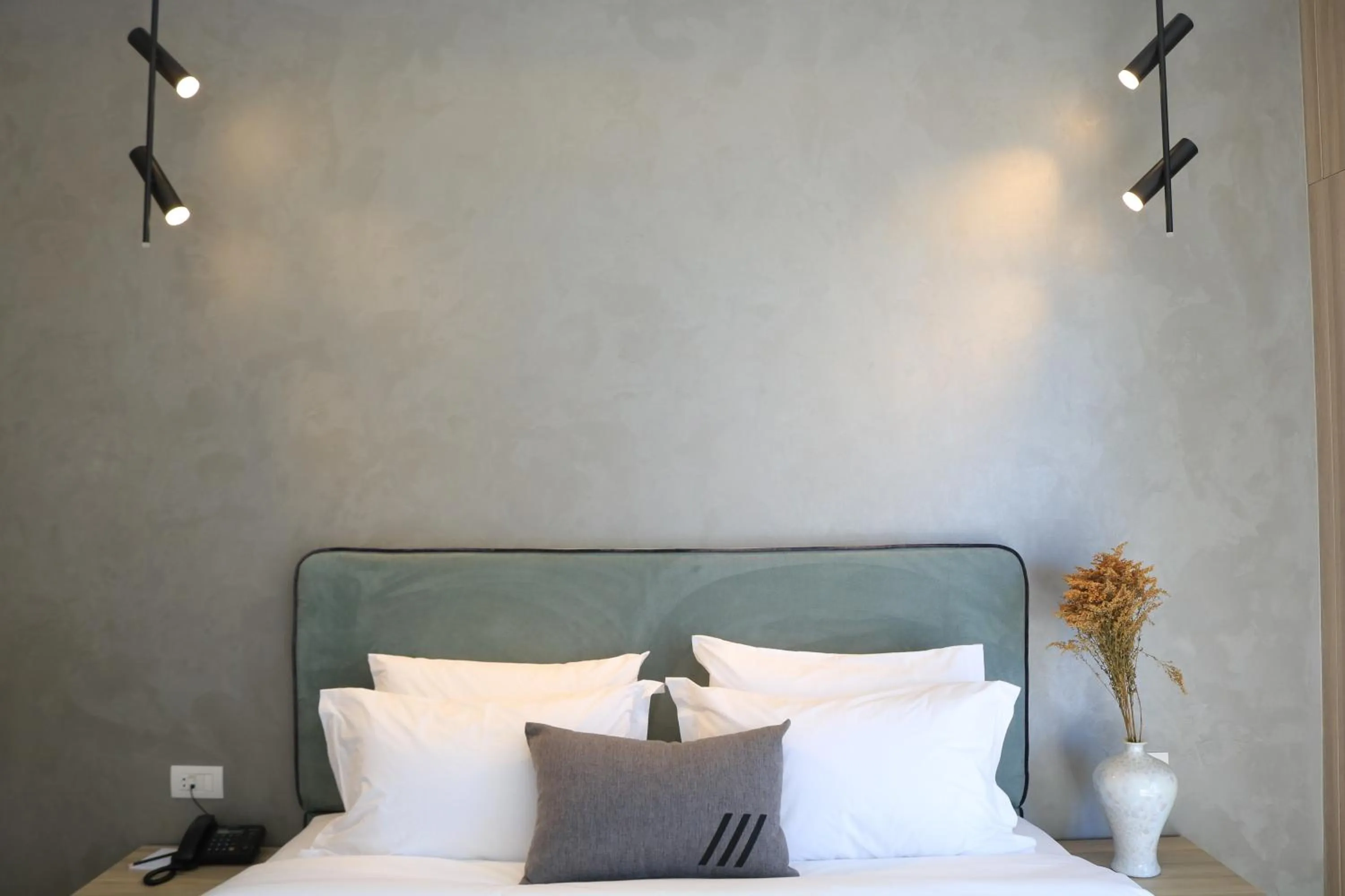 Bed in ZUR Studios and Suites