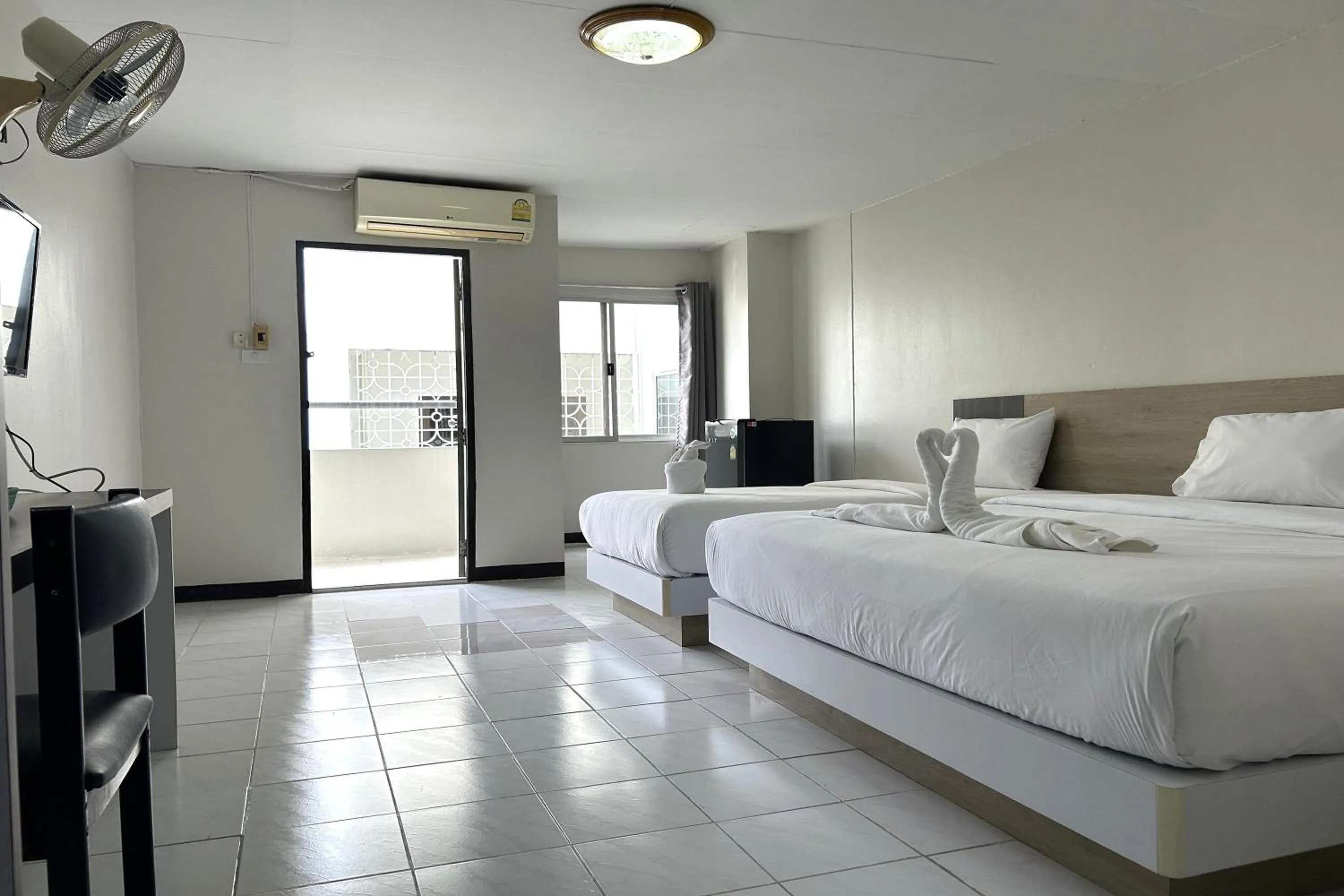 Bed in Boonchai Mansion