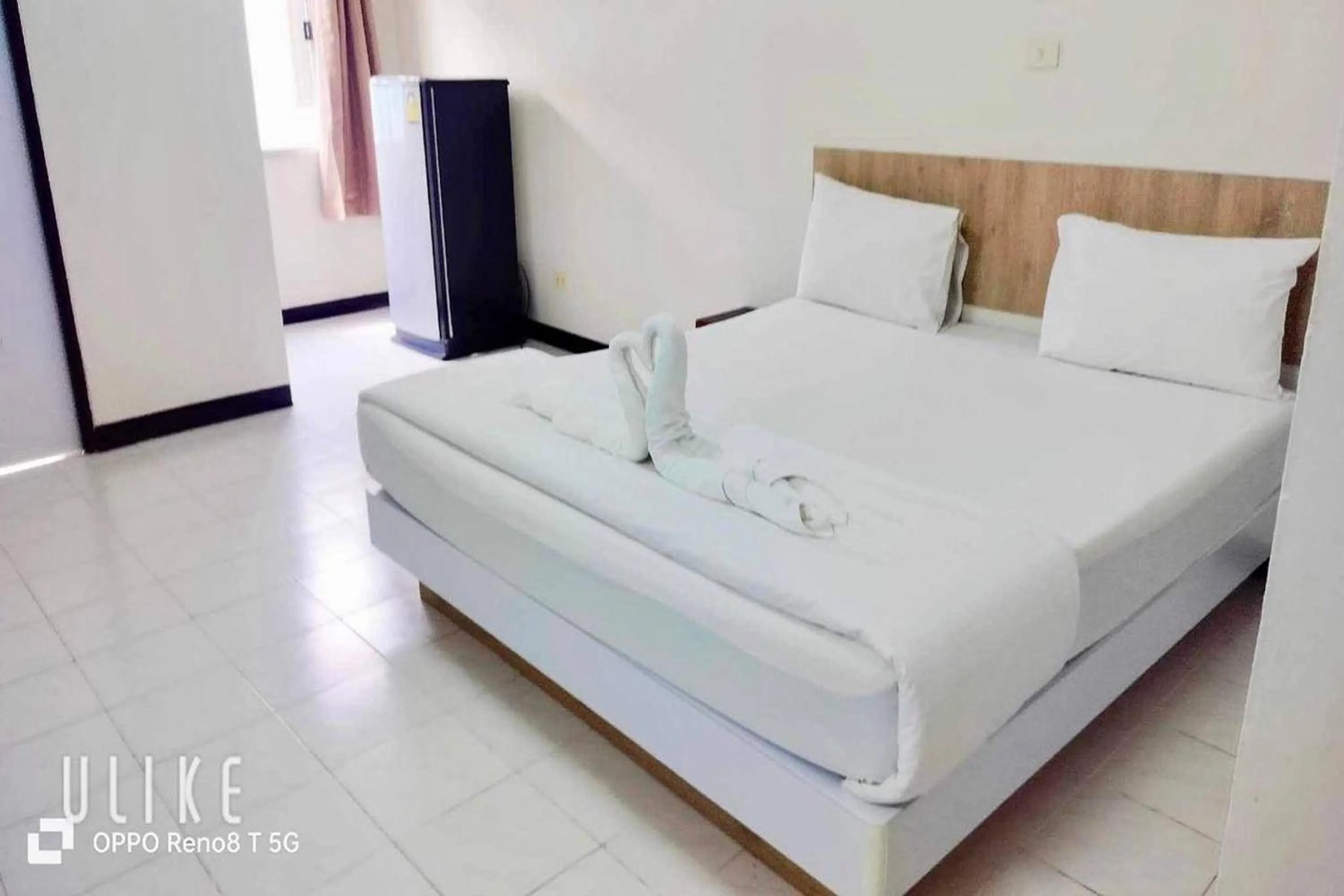 Bed in Boonchai Mansion