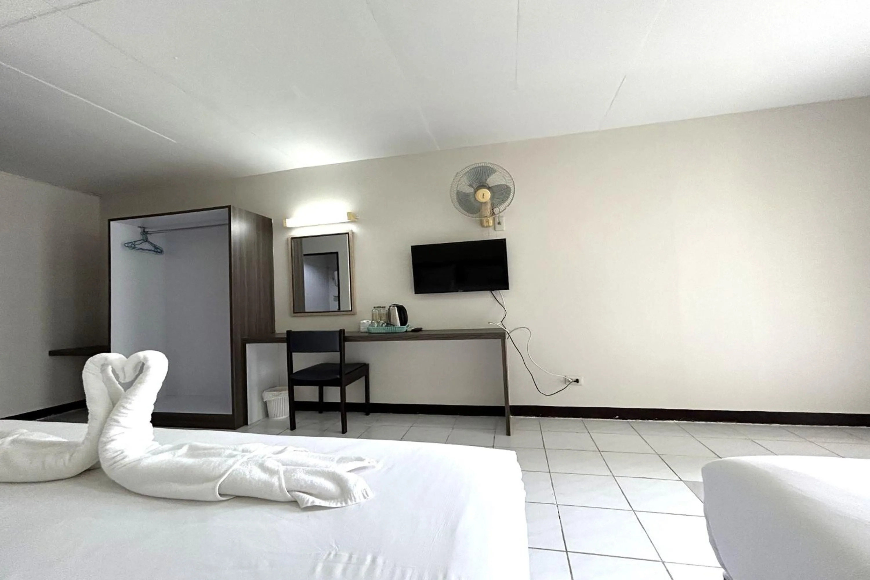 Bed in Boonchai Mansion