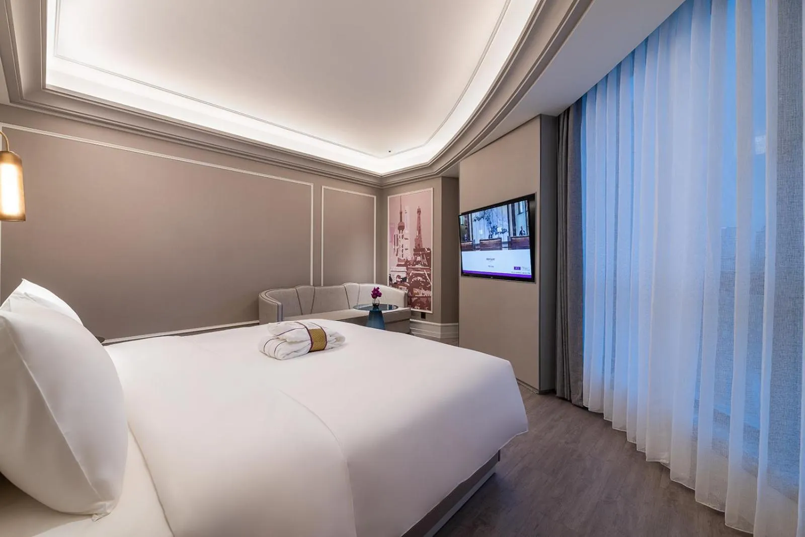 Bed in Mercure Shanghai Guangda Convention and Exhibition Center