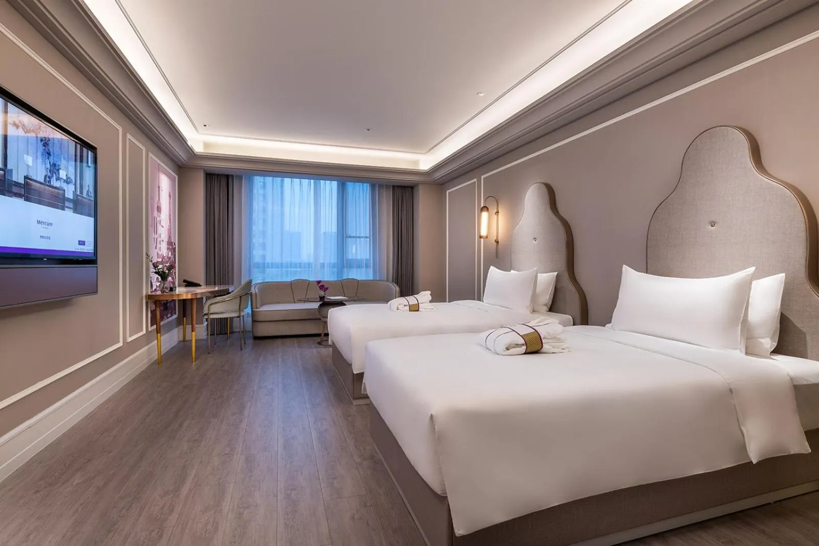 Bed in Mercure Shanghai Guangda Convention and Exhibition Center