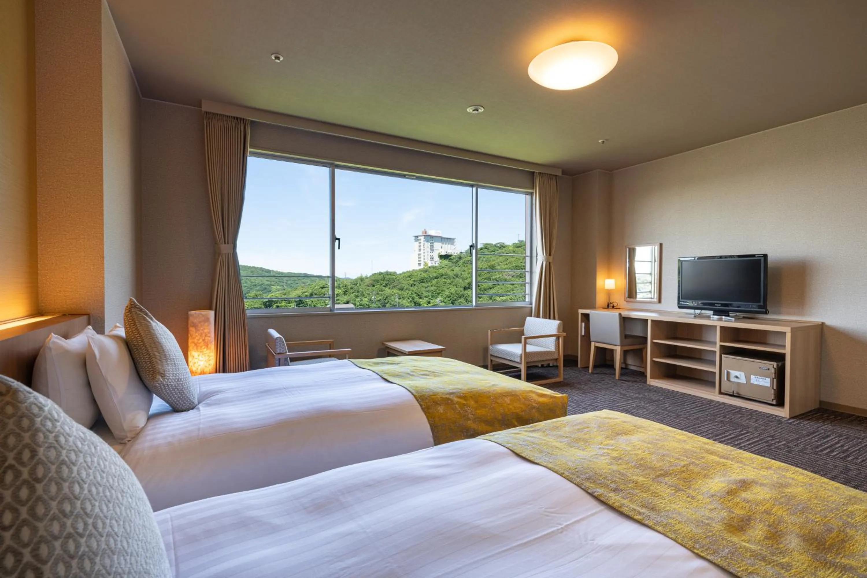 Photo of the whole room, Bed in KAMENOI HOTEL Toba