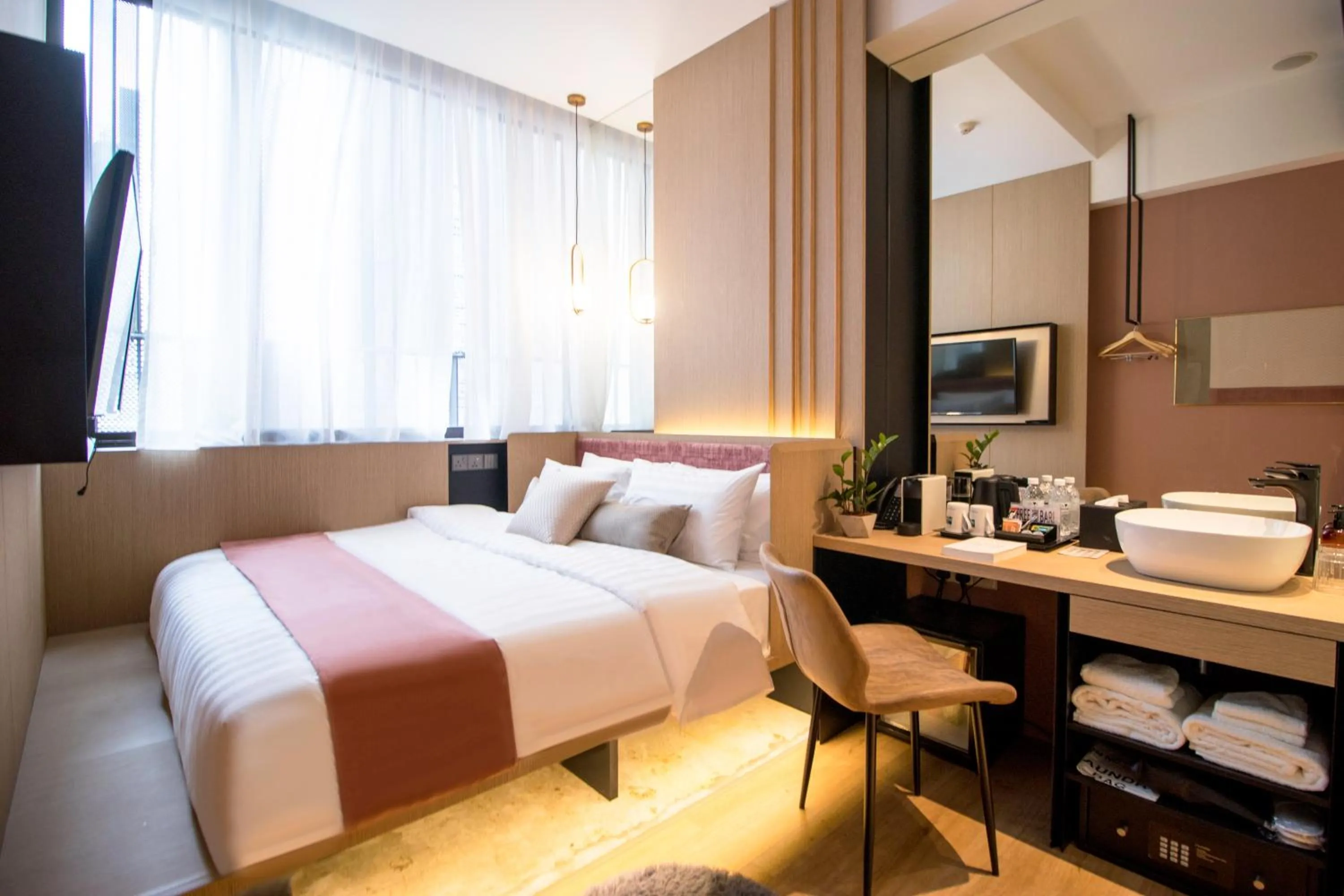 Bed in Hotel NuVe Elements