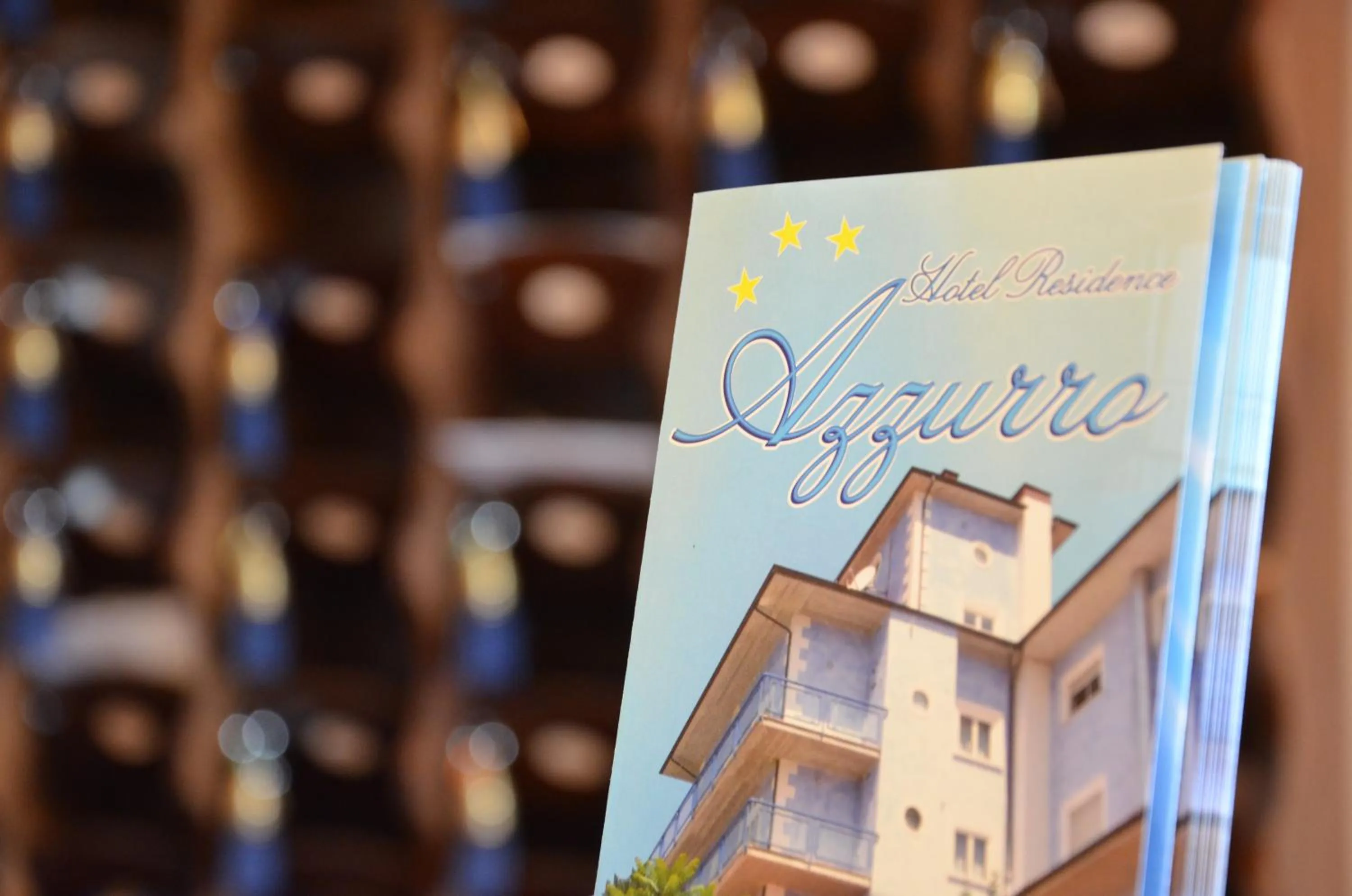 Property logo or sign in Hotel Azzurro