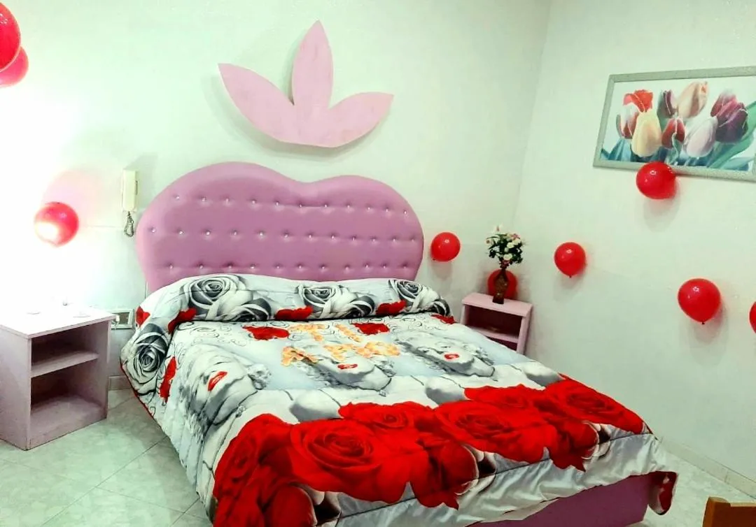 Bed in Hotel Napoleon-Cuore