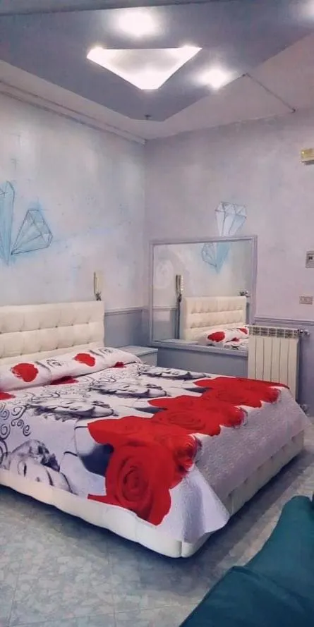 Bed in Hotel Napoleon-Cuore