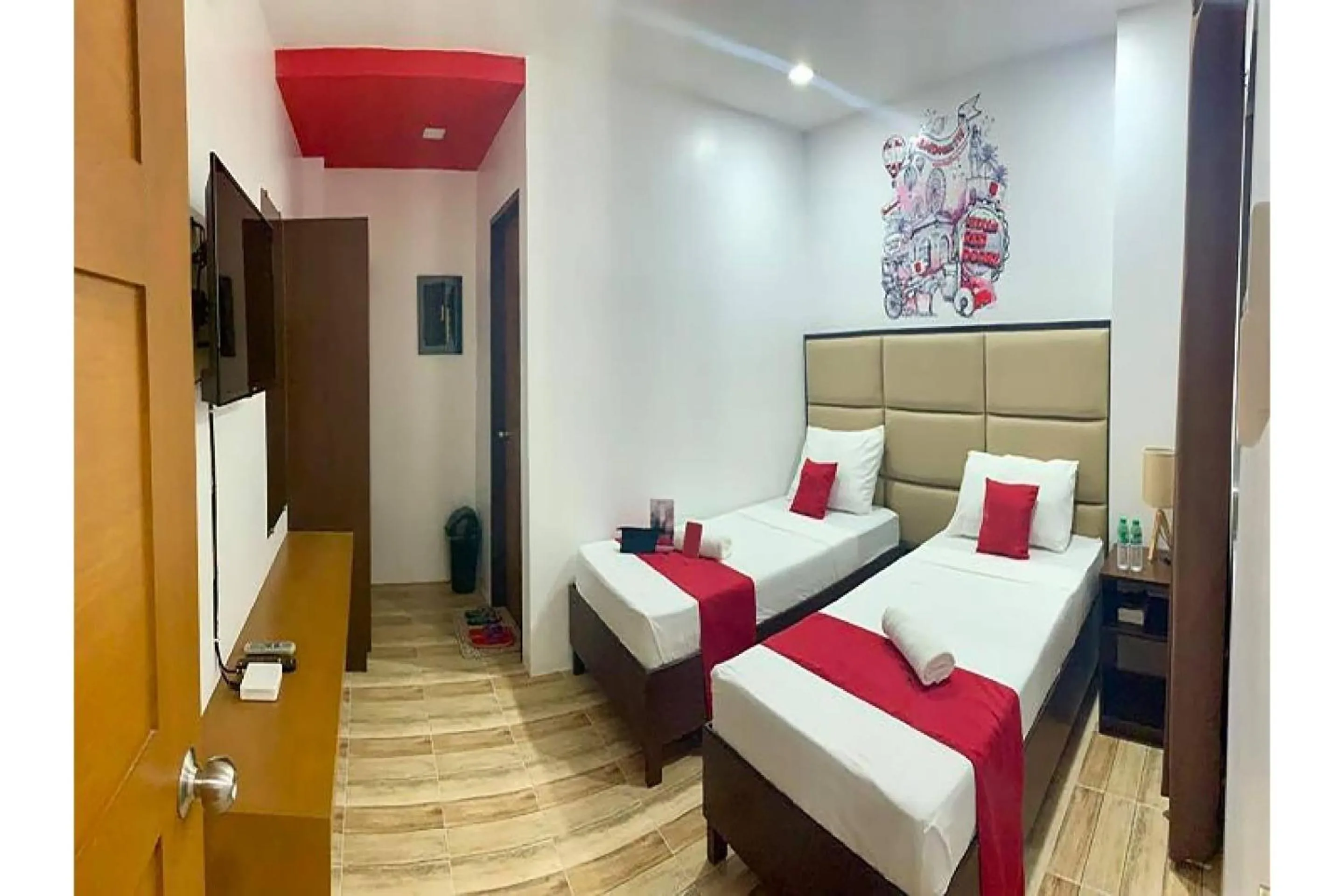 Bedroom in OYO 869 Jnv Dream Hotel