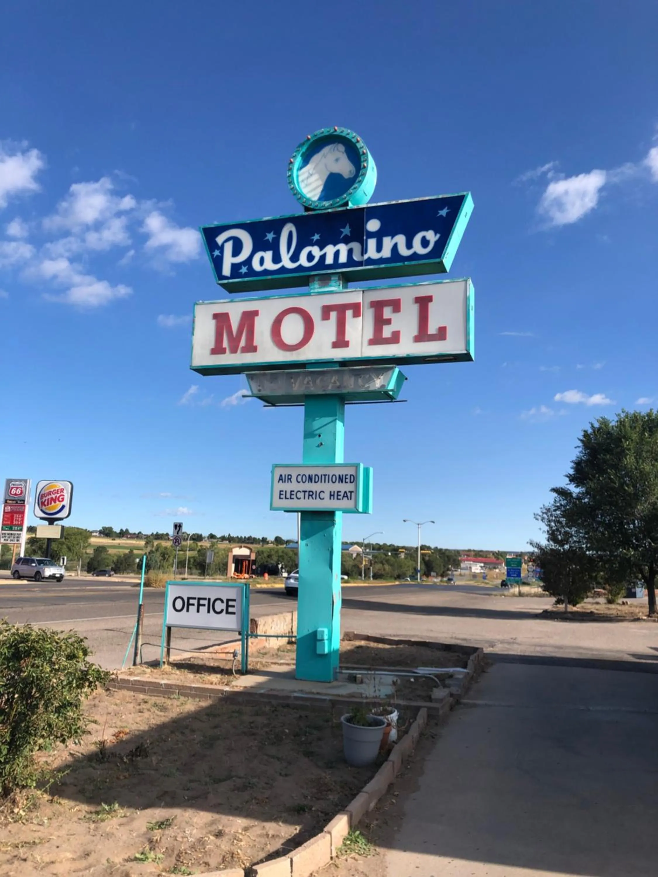 Property logo or sign in Palomino Motel