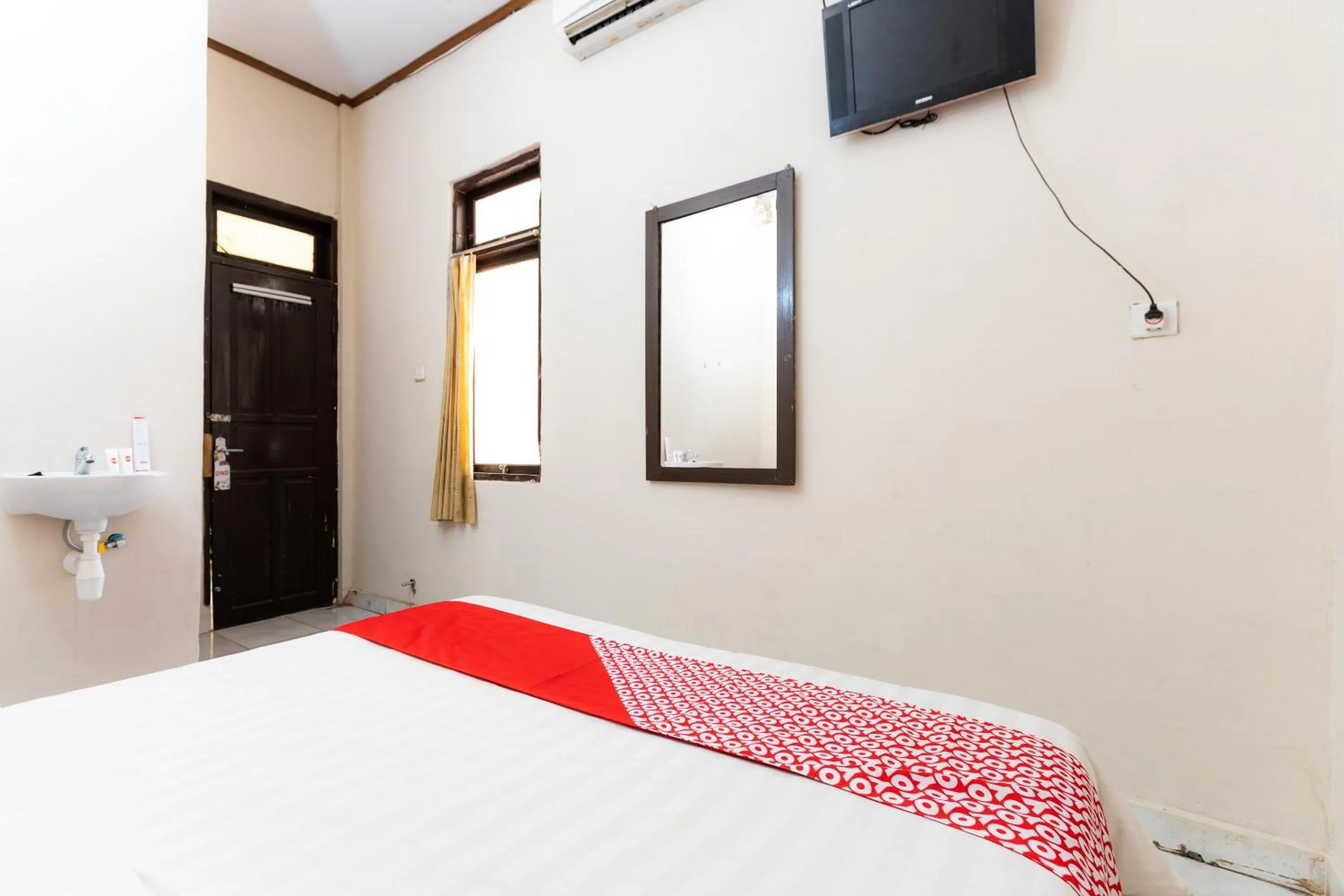 Bedroom in Hotel O Wisma Pelita Mas