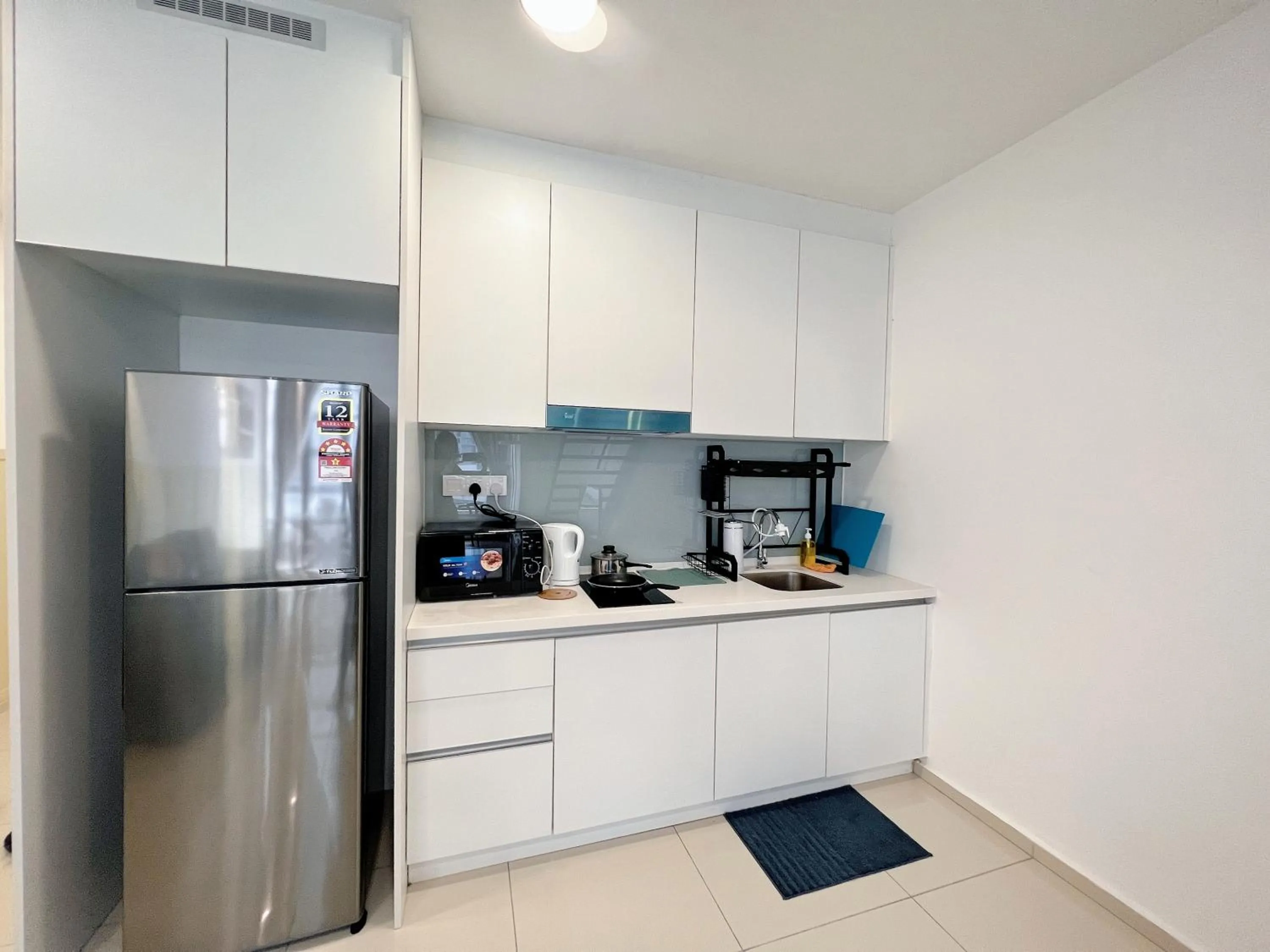 Kitchen or kitchenette in EkoCheras Designer Suite by Moka @ Cheras