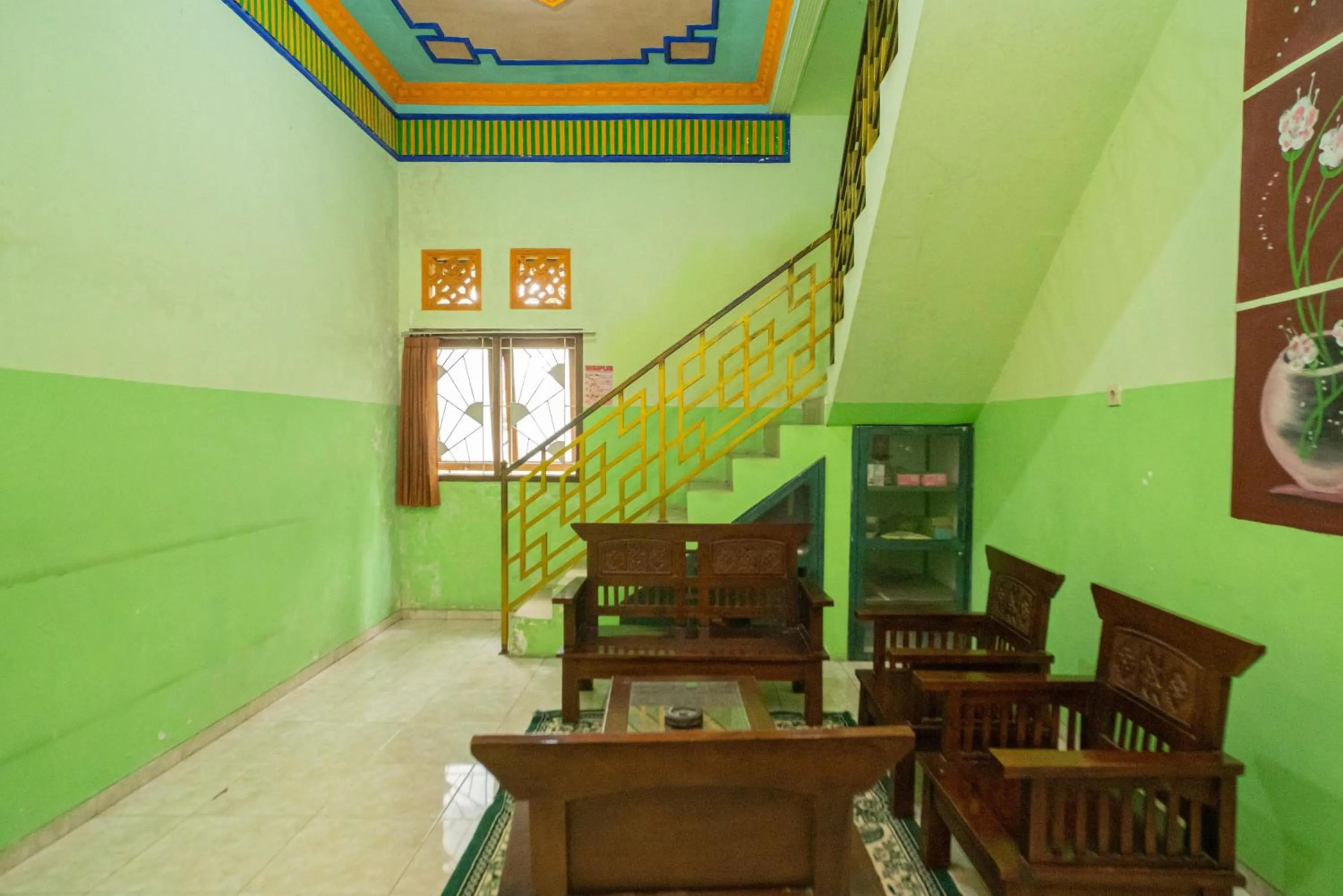 Seating area in RedDoorz Syariah near Batu Night Spectacular 3