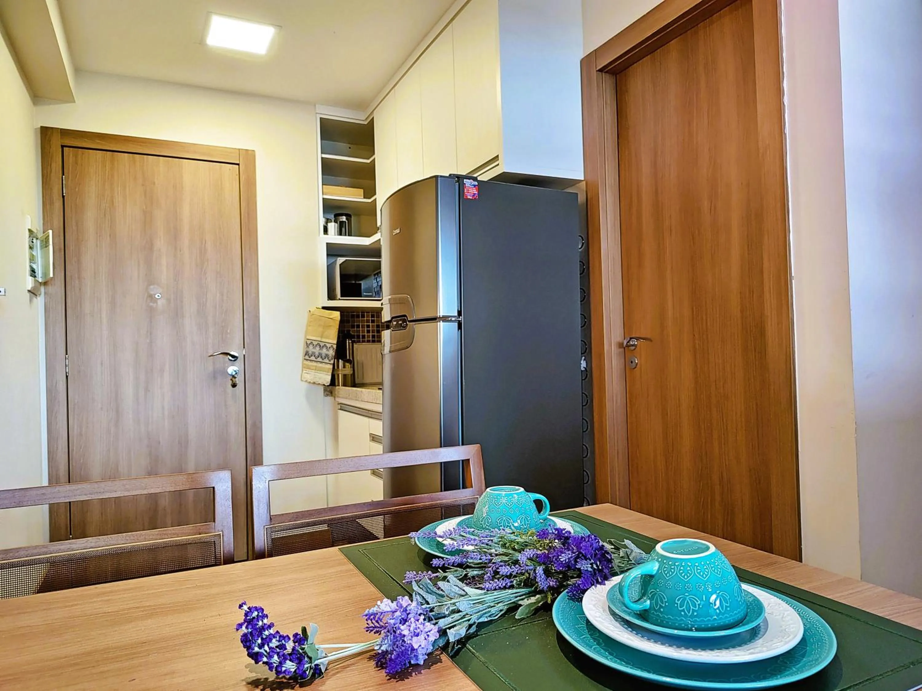 Kitchen or kitchenette in FLAT VARANDA PEDRA AZUL - Vista Azul Apart Hotel