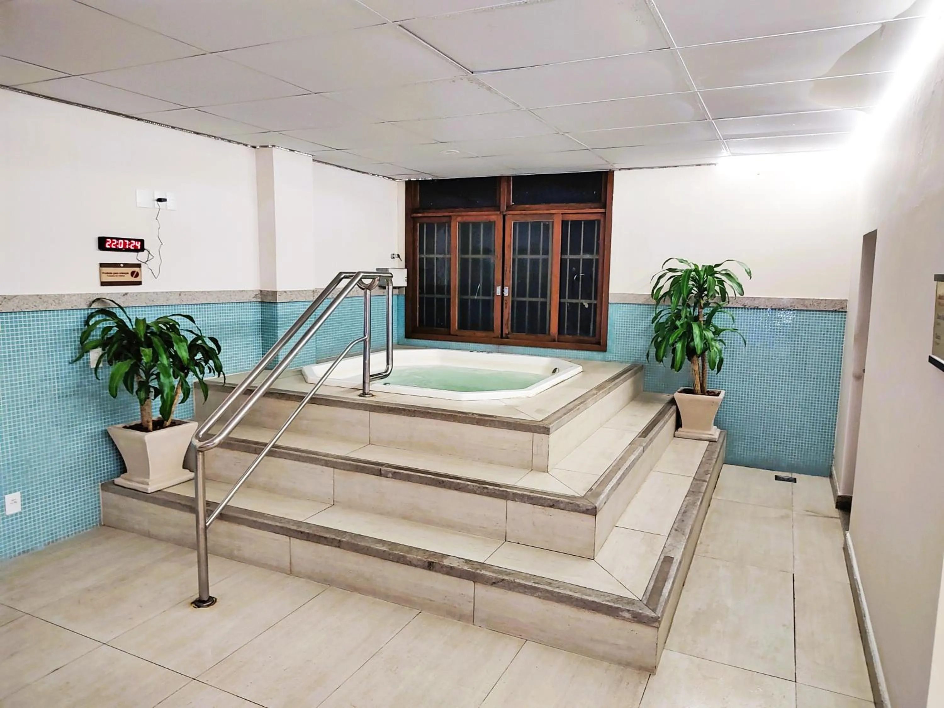 Hot Tub, Bed in FLAT VARANDA PEDRA AZUL - Vista Azul Apart Hotel