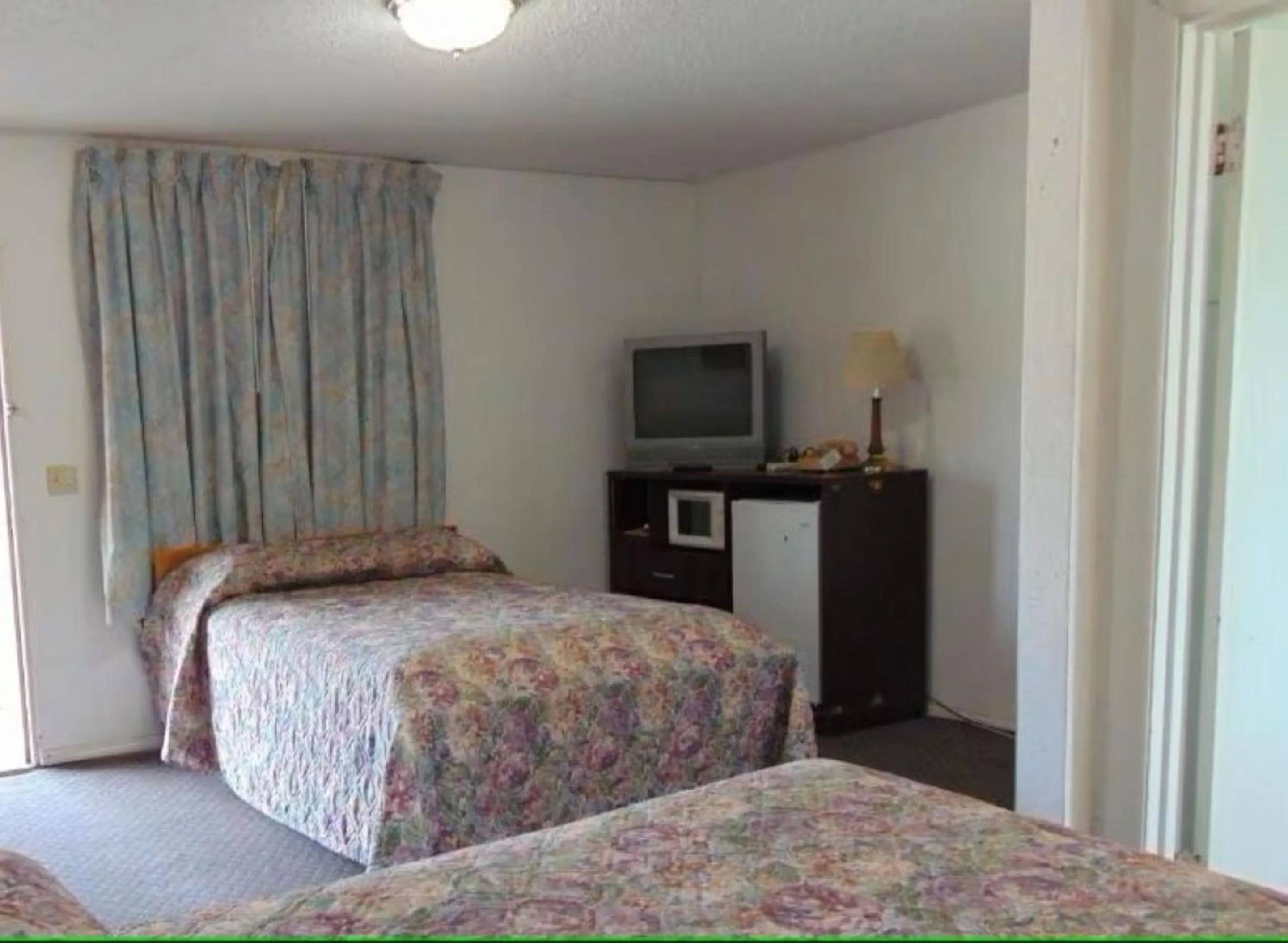 Bedroom in Heritage Budget Inn By OYO Hwy 84