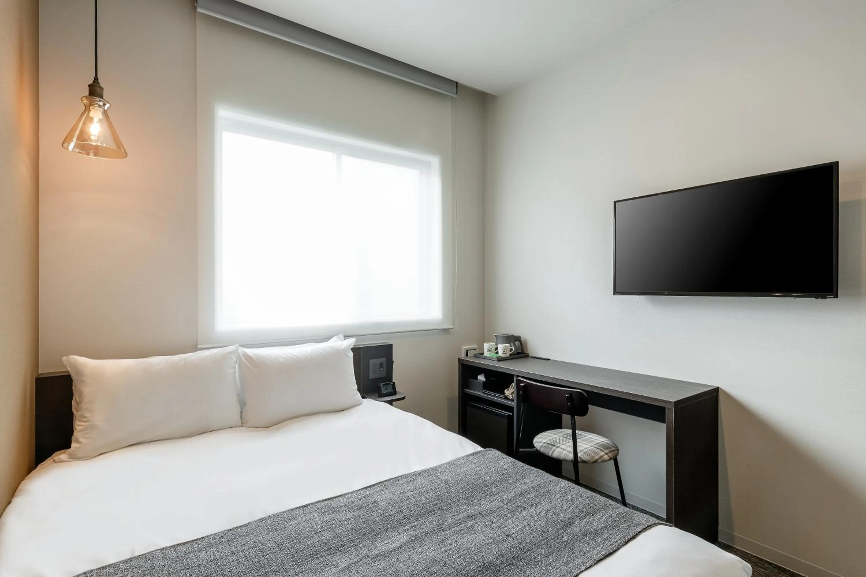 Bed in M's Hotel Kyoto Station Kasuga