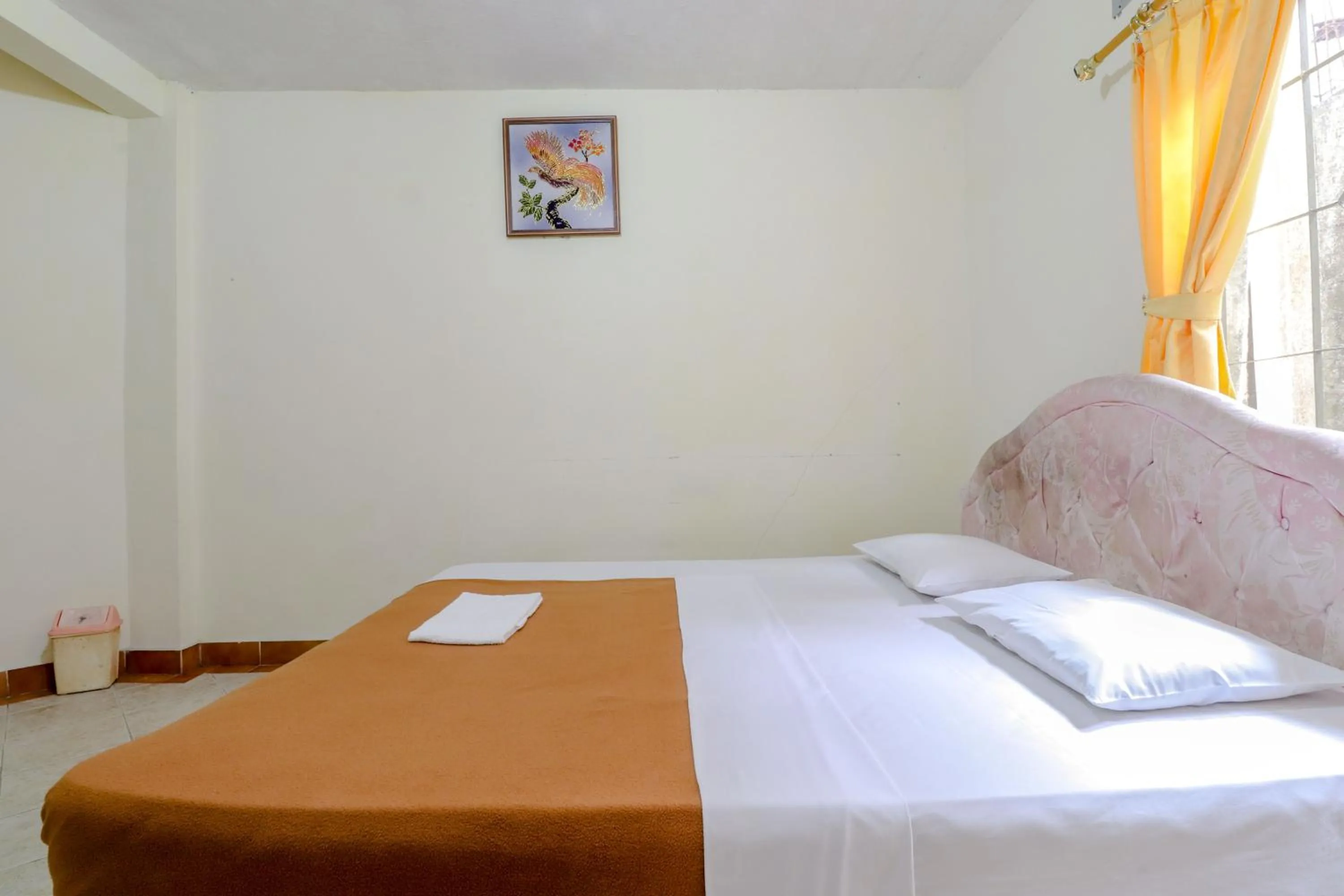 Bed in Hotel Kayu Manis