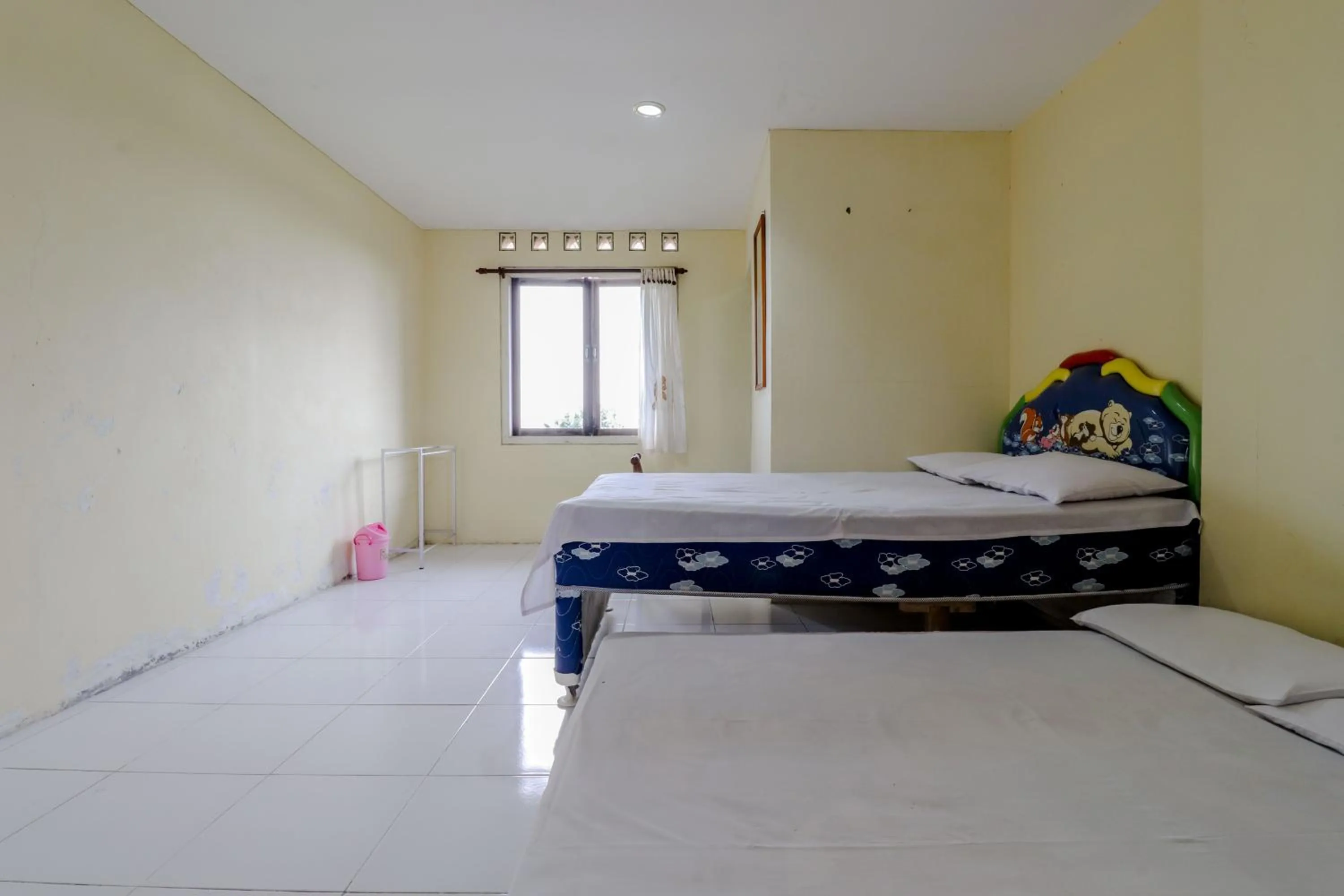 Bed in Hotel Kayu Manis