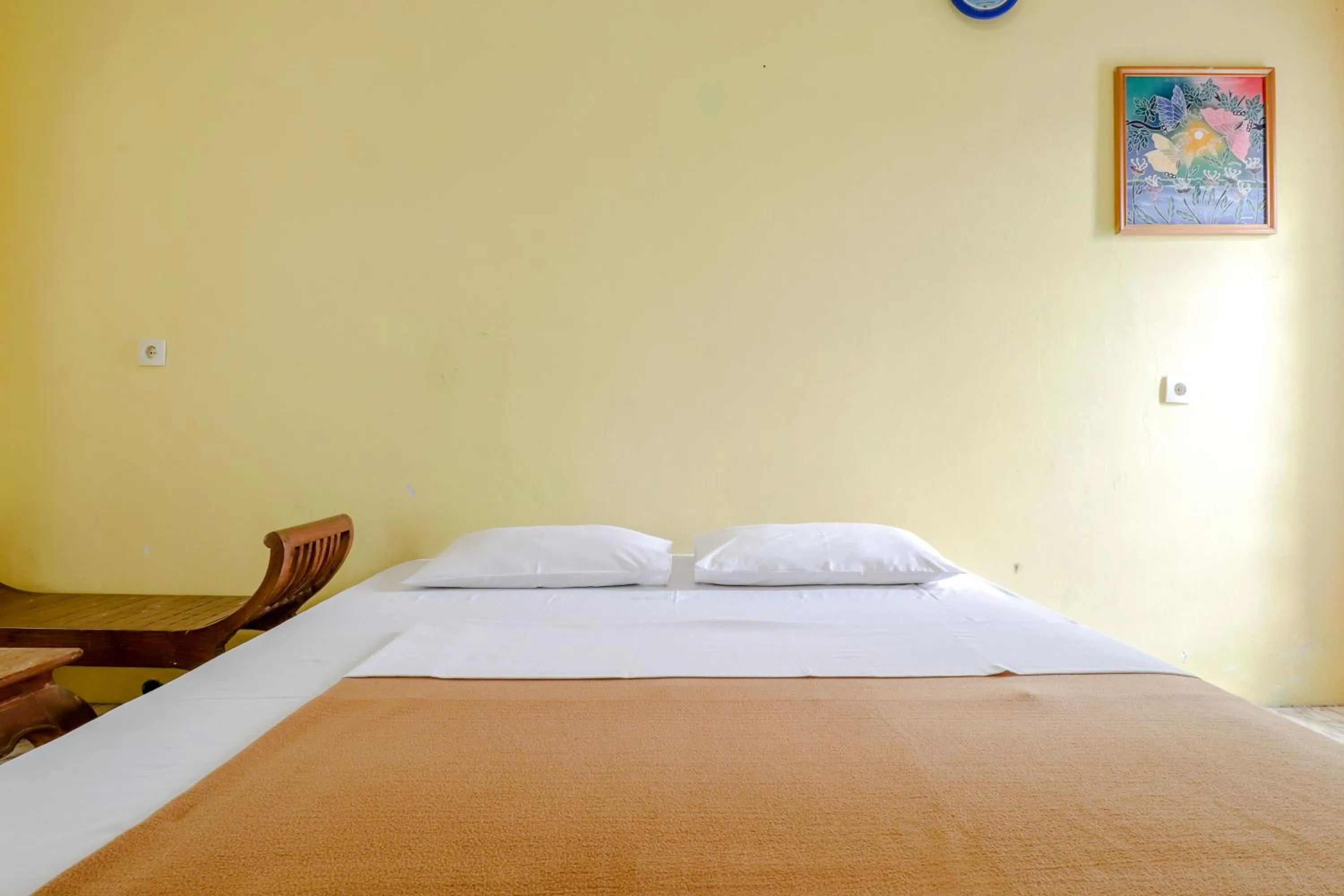 Bed in Hotel Kayu Manis