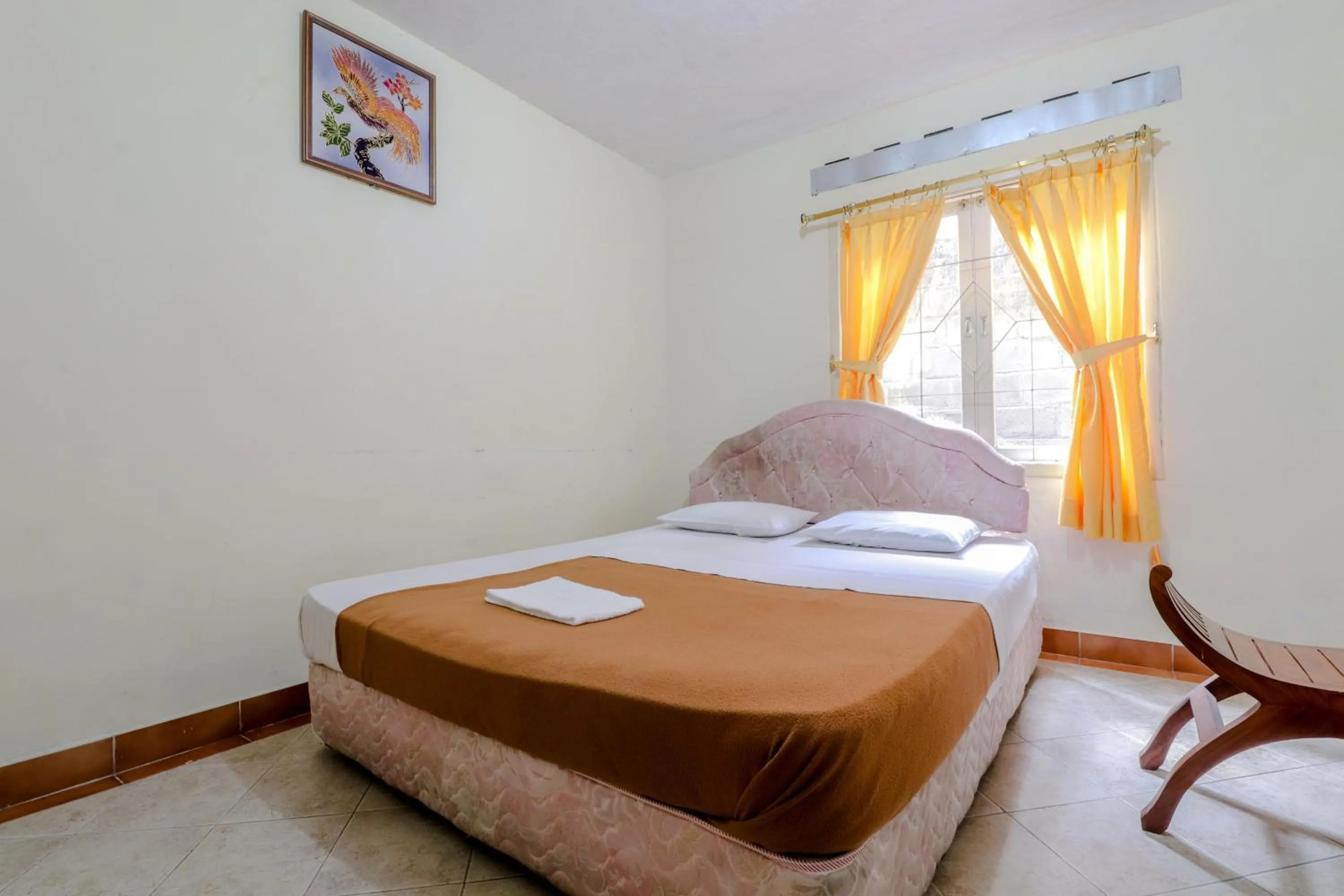 Bed in Hotel Kayu Manis