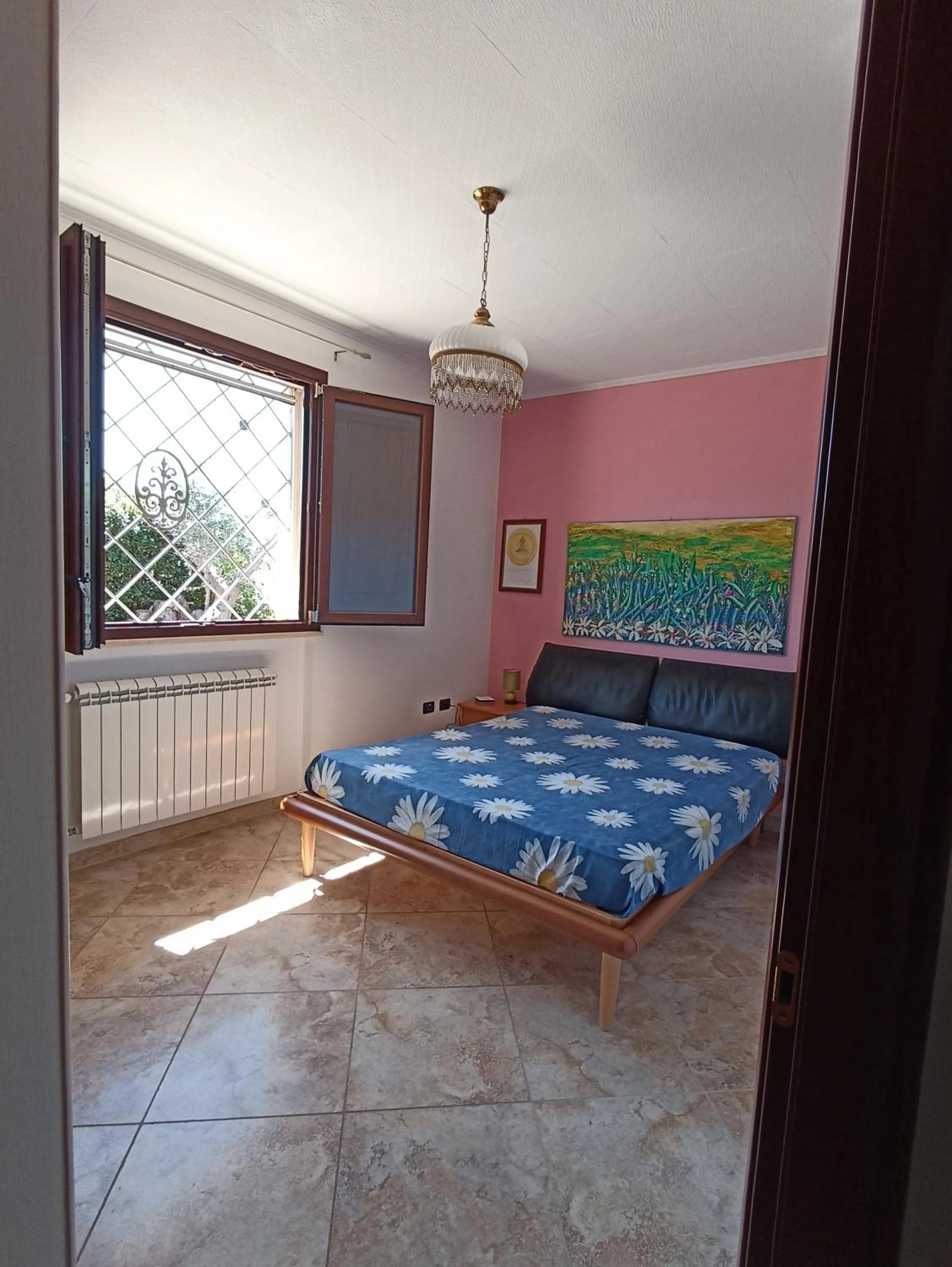 Photo of the whole room, Bed in Portoselvaggio Villa Martina