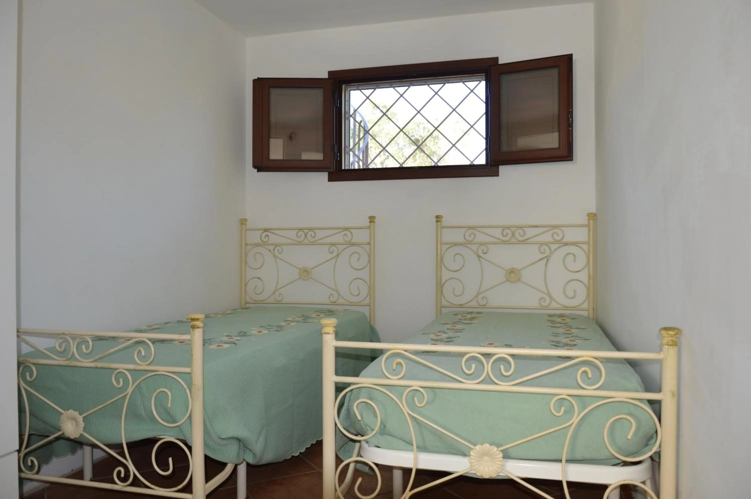 Bedroom, Bed in Portoselvaggio Villa Martina
