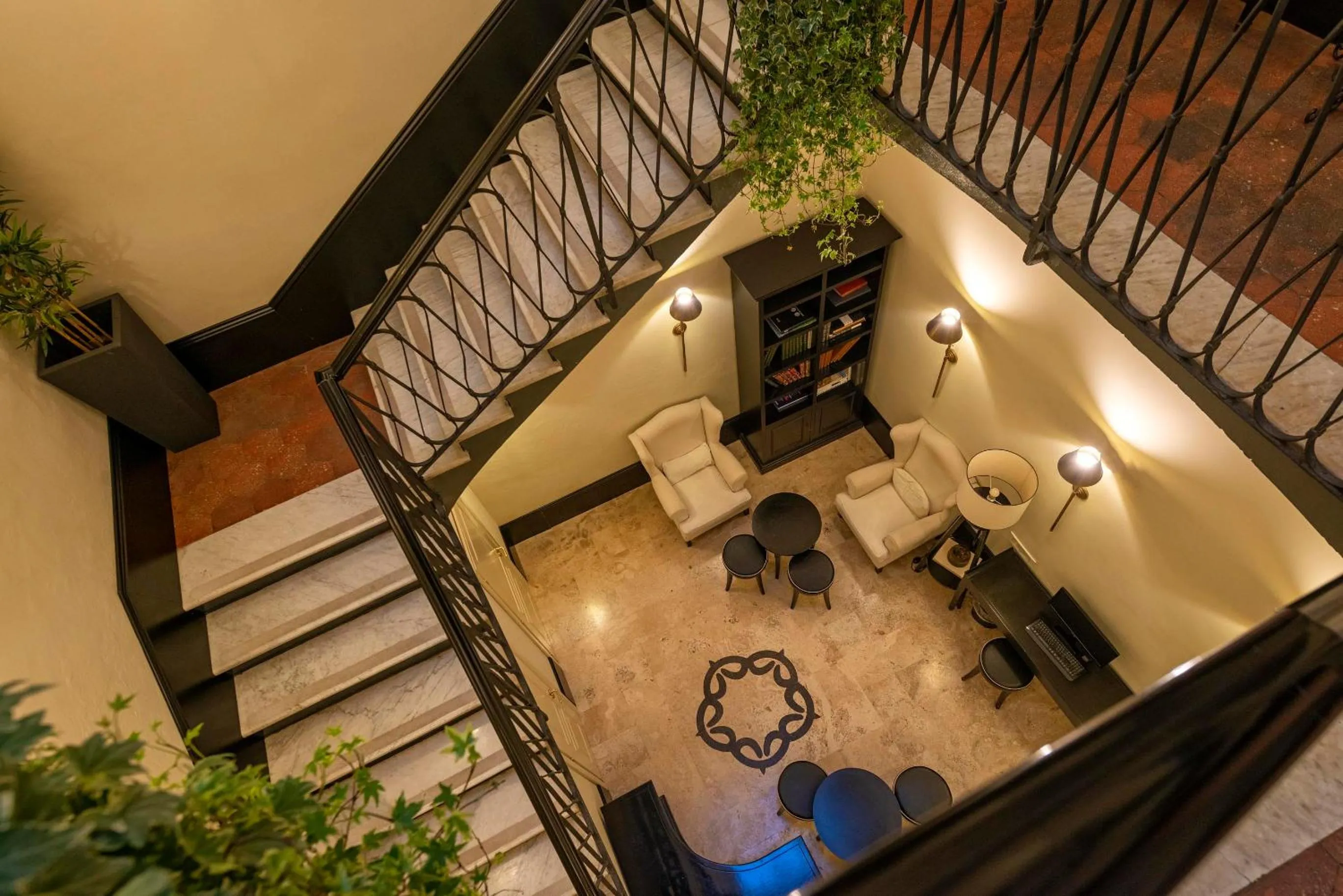 Seating area in Profumo Maison Colosseo
