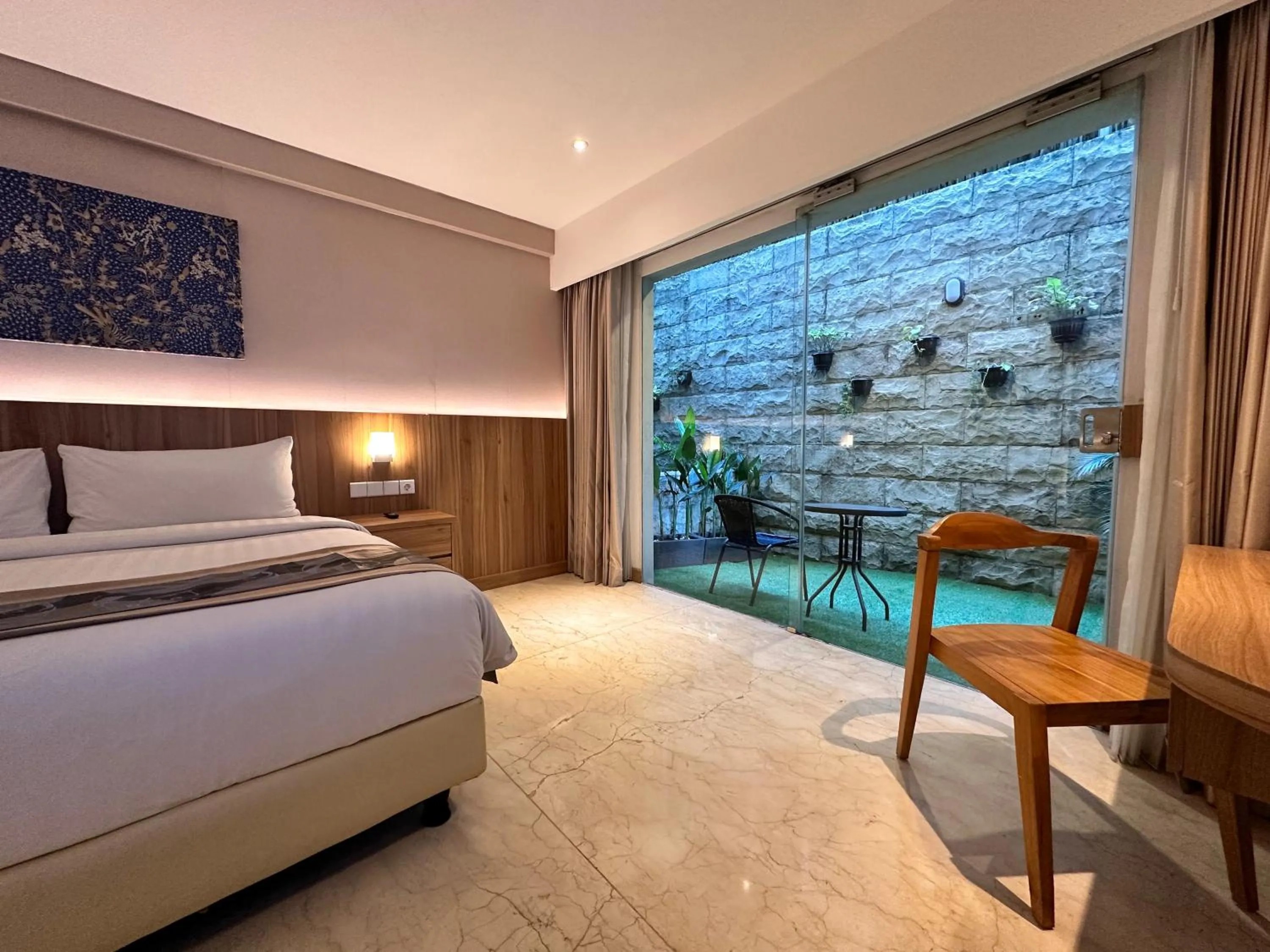 View (from property/room), Bed in The Capital Hotel and Resort Seminyak