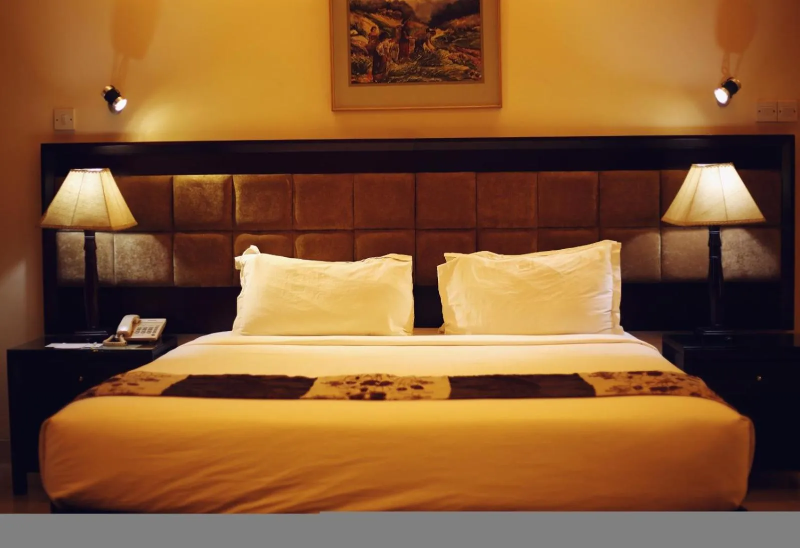 Bed in The Avenue Hotel & Suites