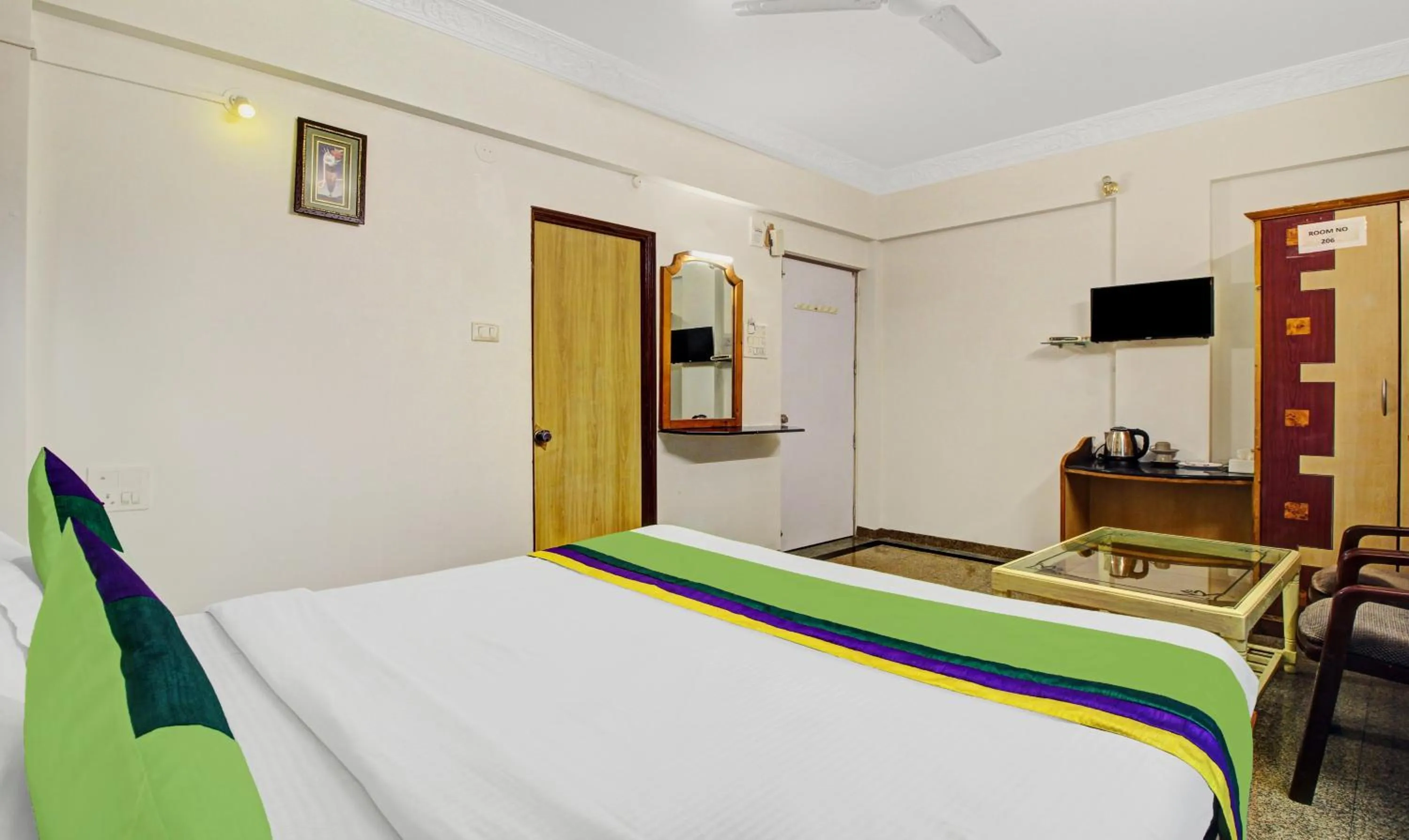 Bedroom, Bed in Treebo Eagle Executive