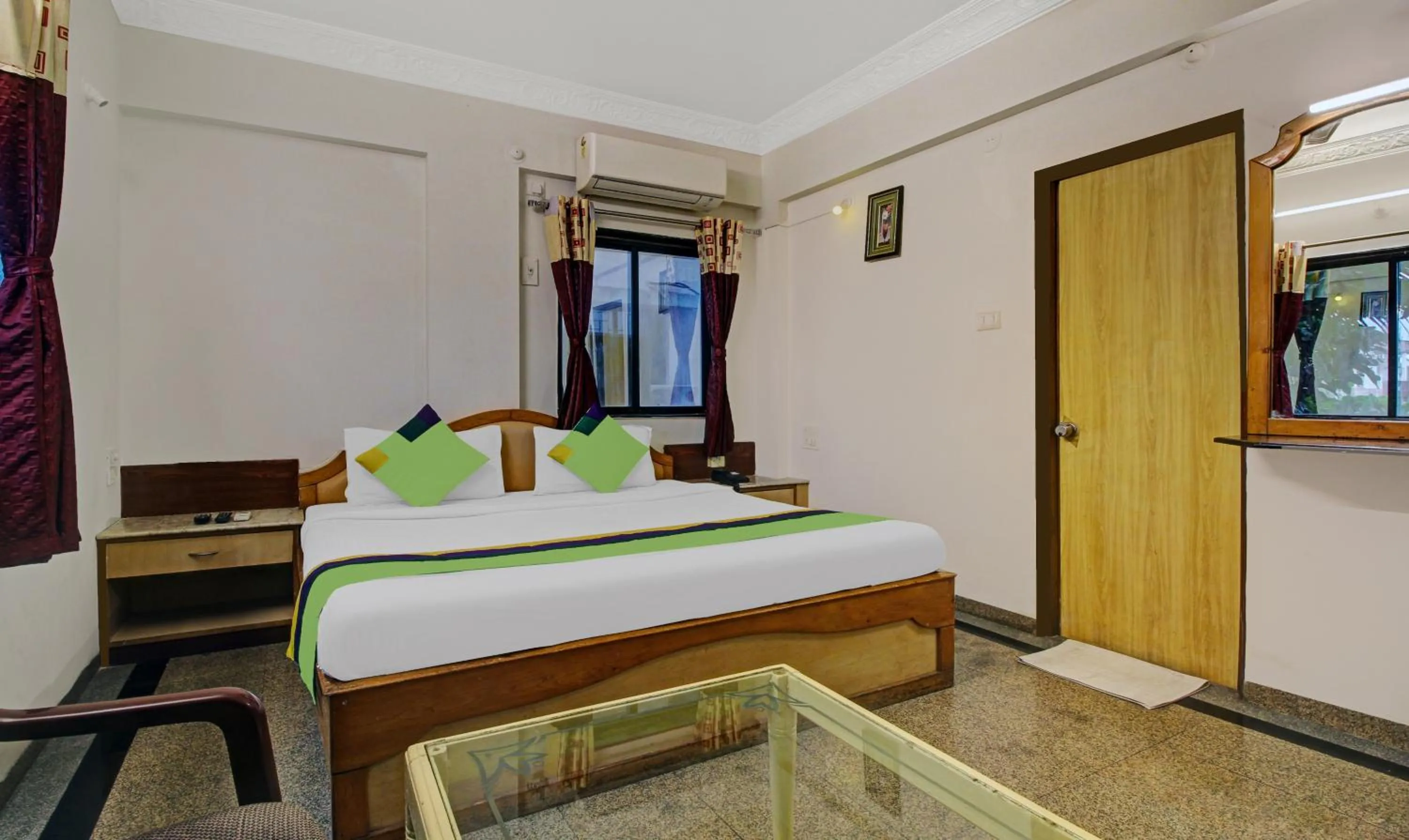 Bedroom, Bed in Treebo Eagle Executive