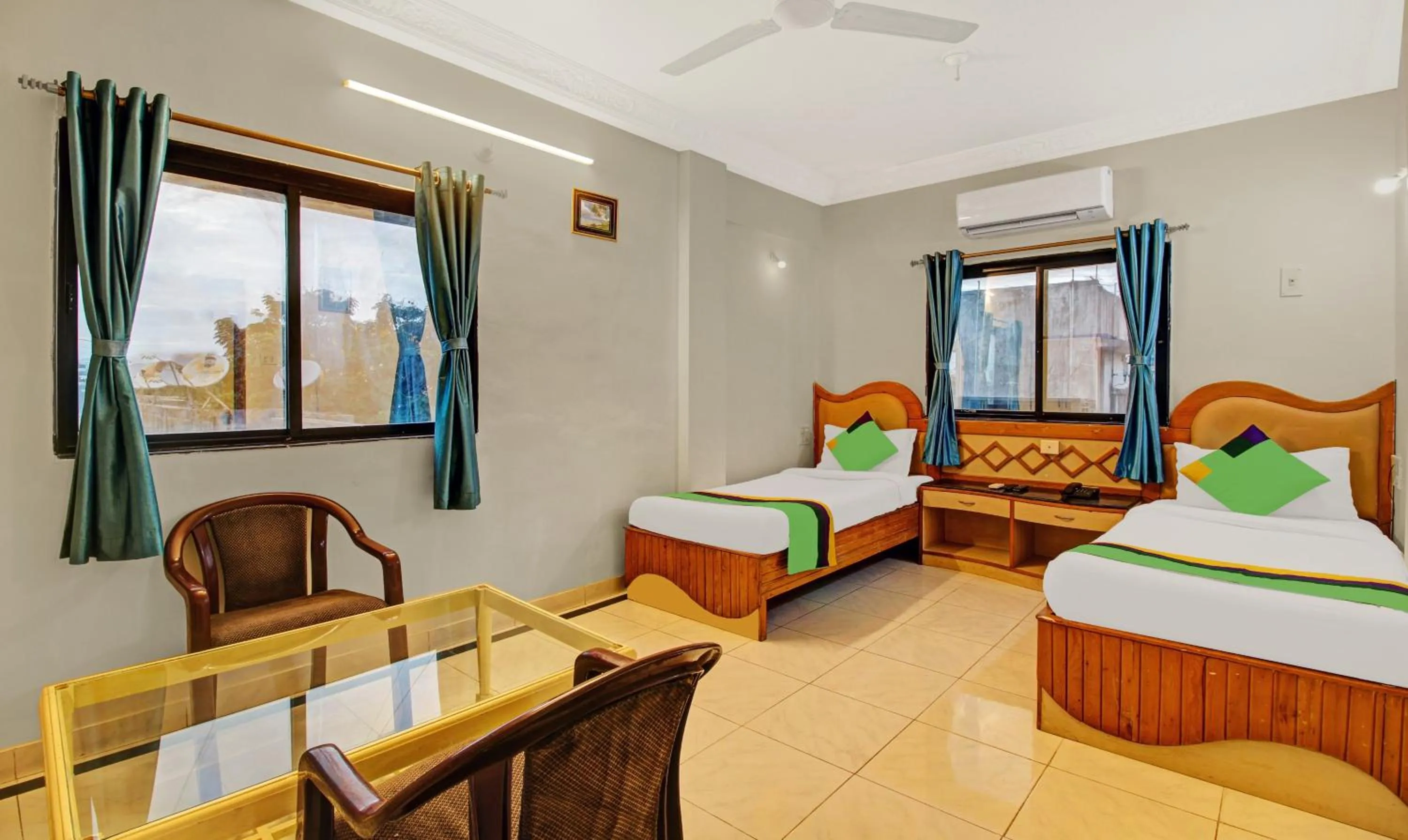 Bedroom, Bed in Treebo Eagle Executive