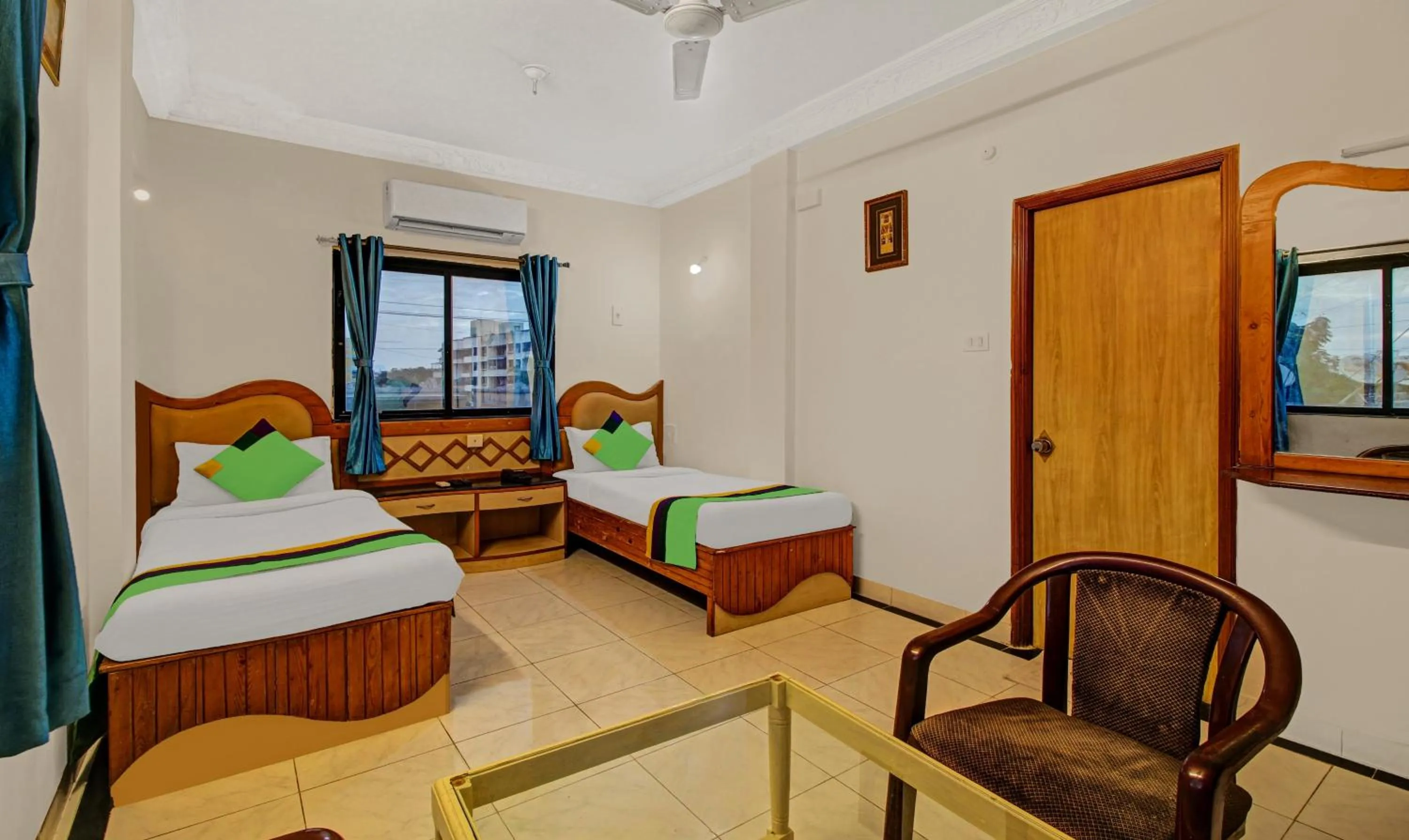 Bedroom, Bed in Treebo Eagle Executive