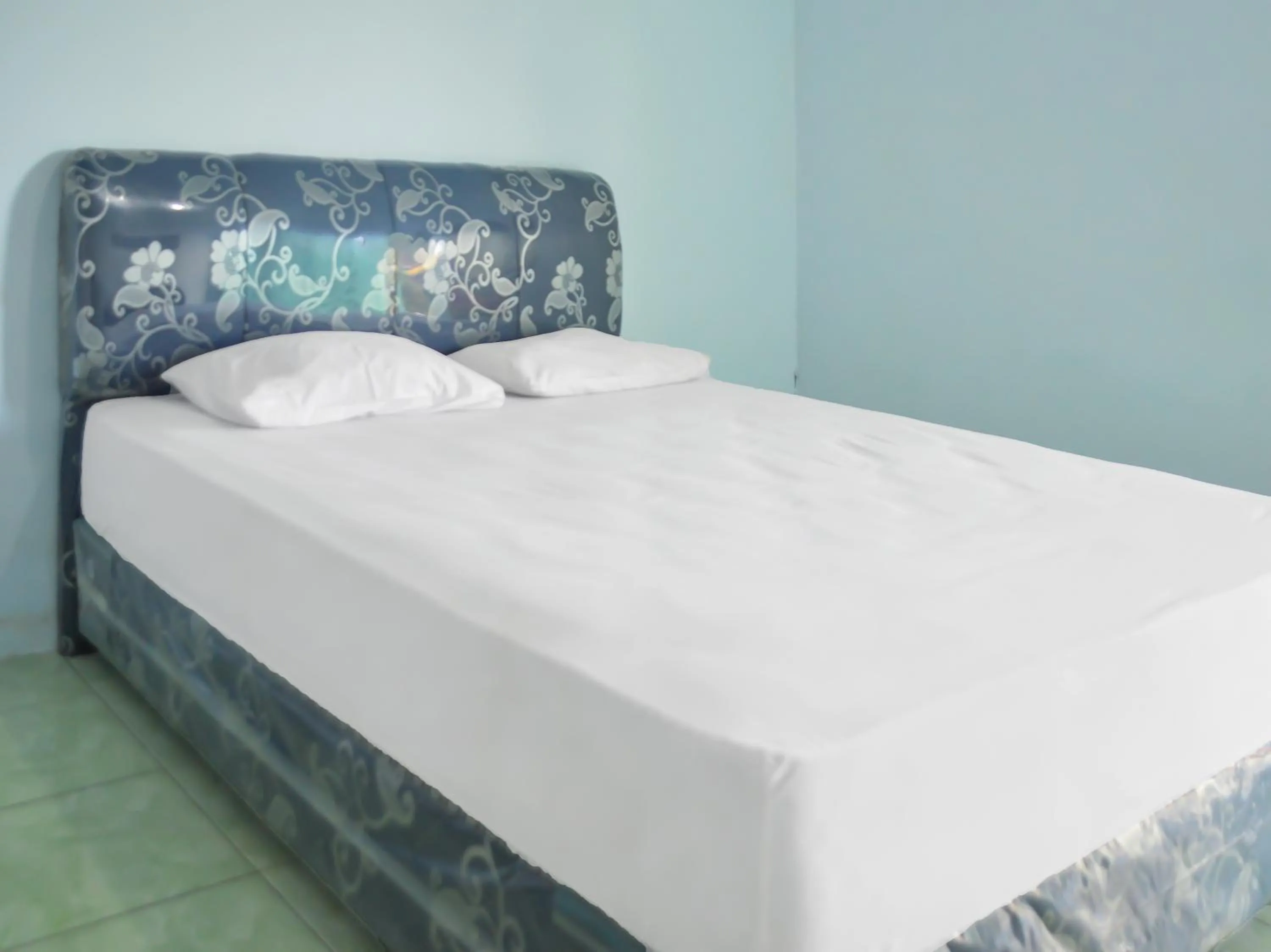 Bedroom in OYO 1745 Guest House Nur Aziziah Syariah 2