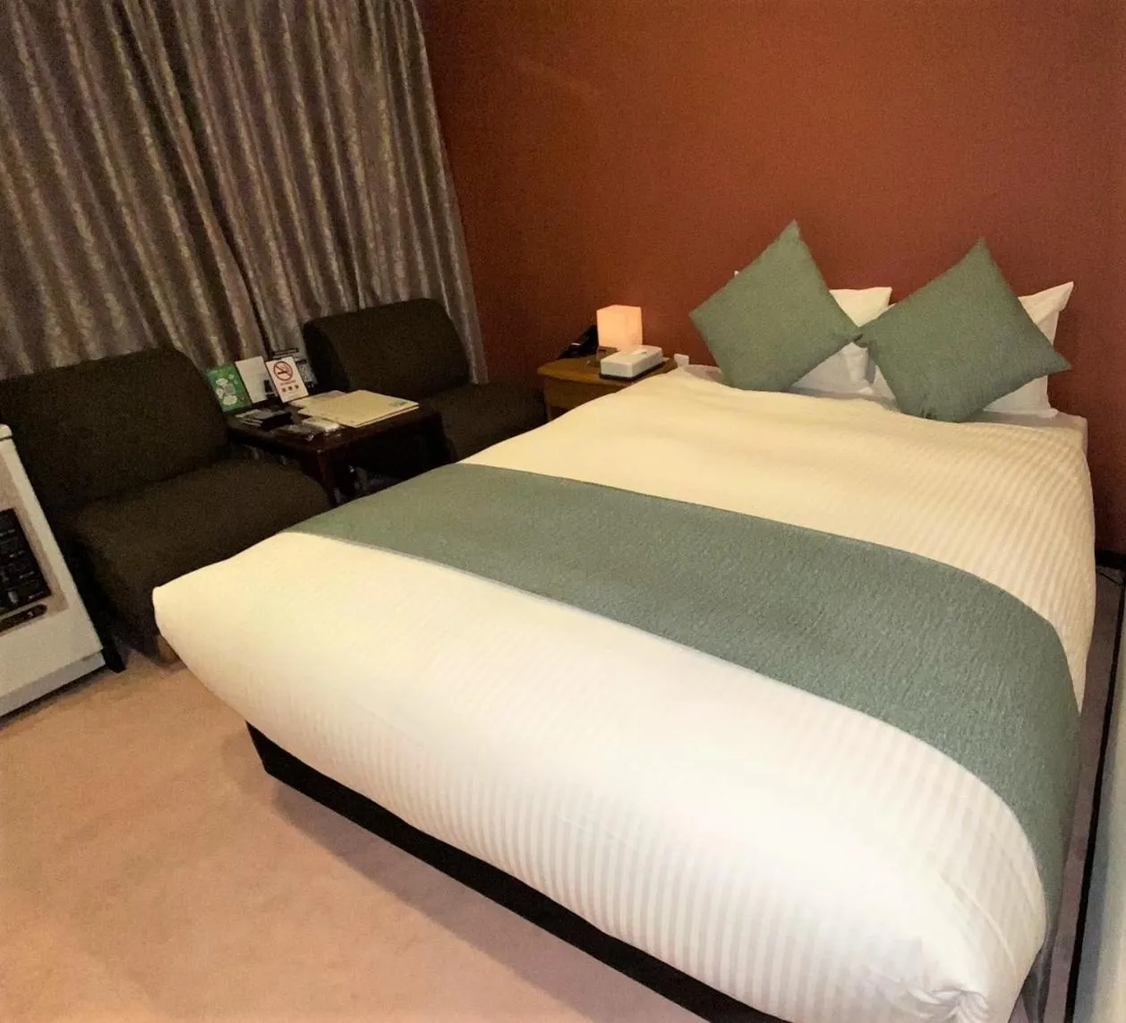 Bed in Roppongi Plaza Hotel