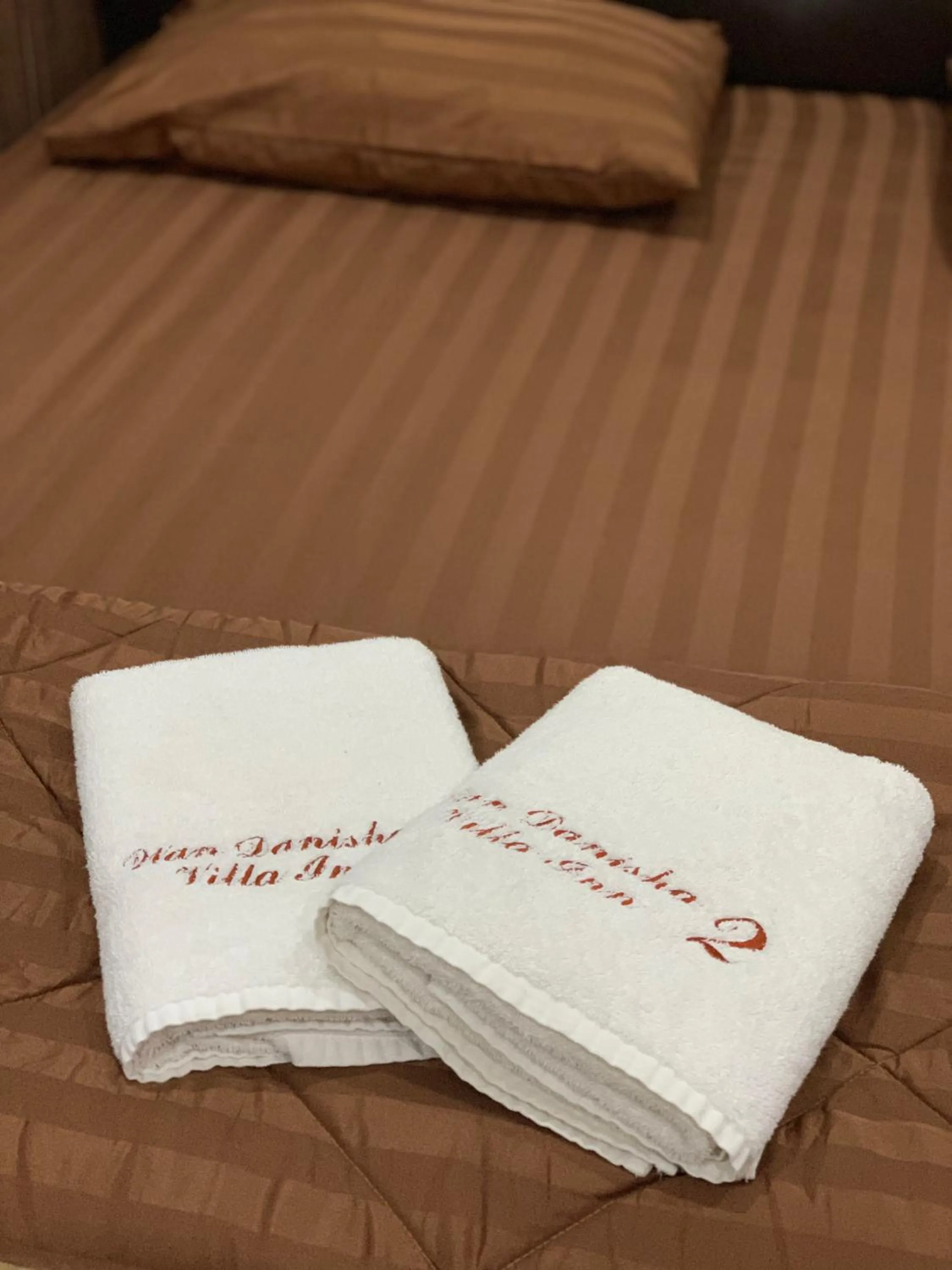 Bed in Wan Danisha Villa Inn