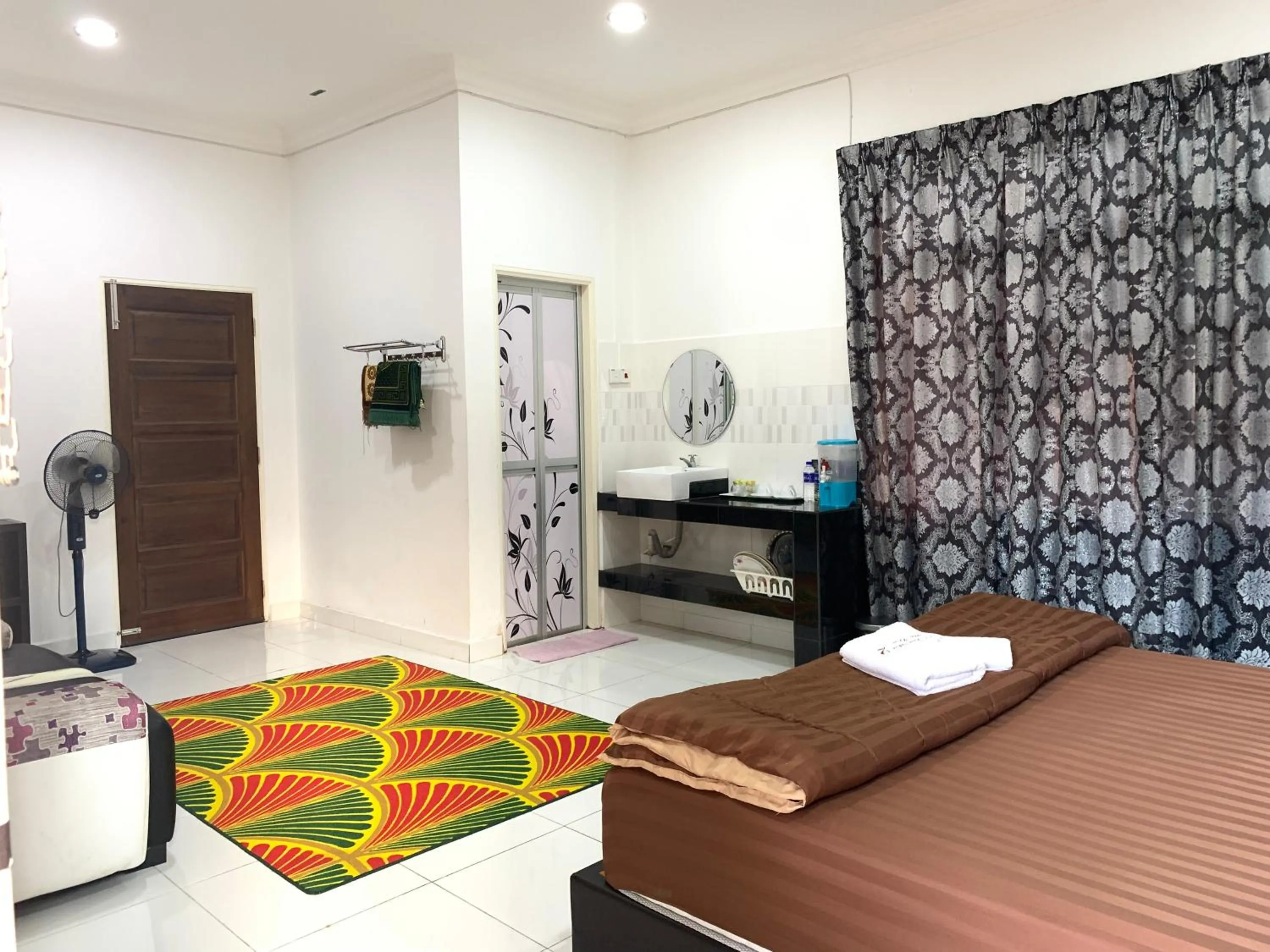 Bed in Wan Danisha Villa Inn