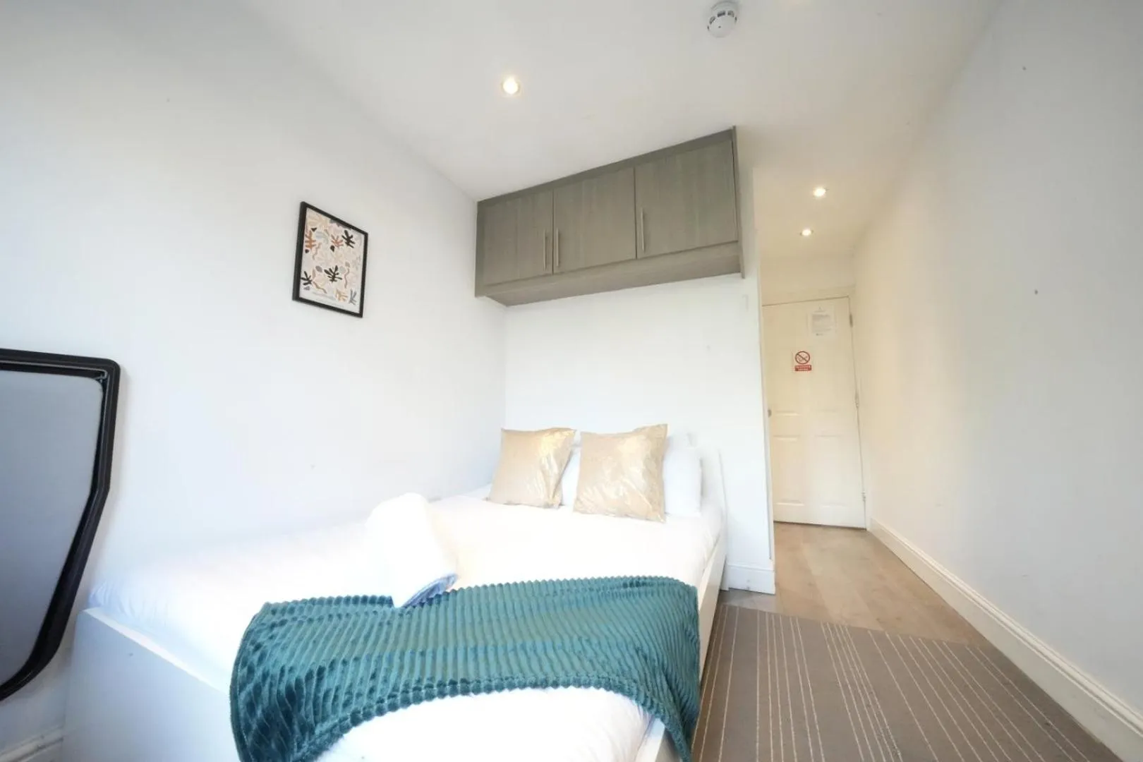 Bed in Grand Airport Ensuites