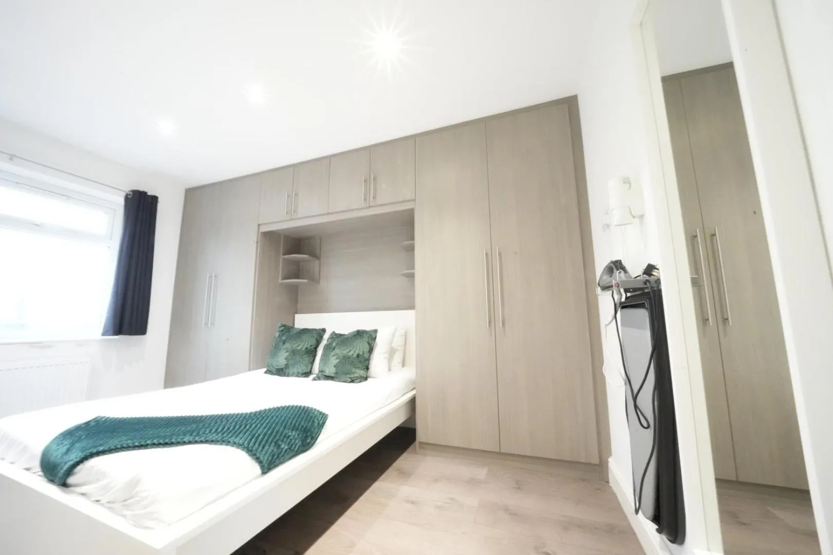 Bed in Grand Airport Ensuites