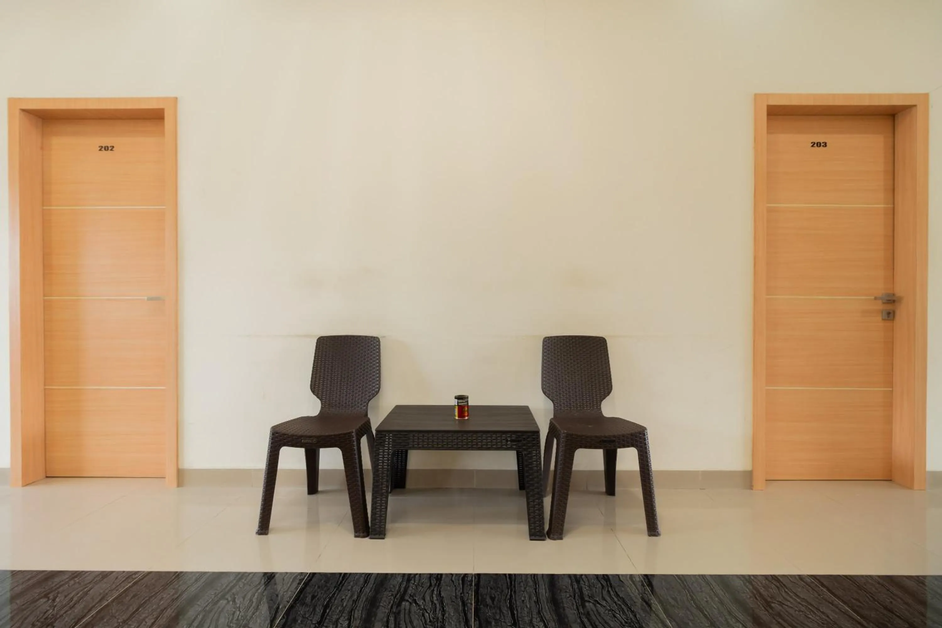 Seating area in RedDoorz Syariah near Minangkabau International Aiport