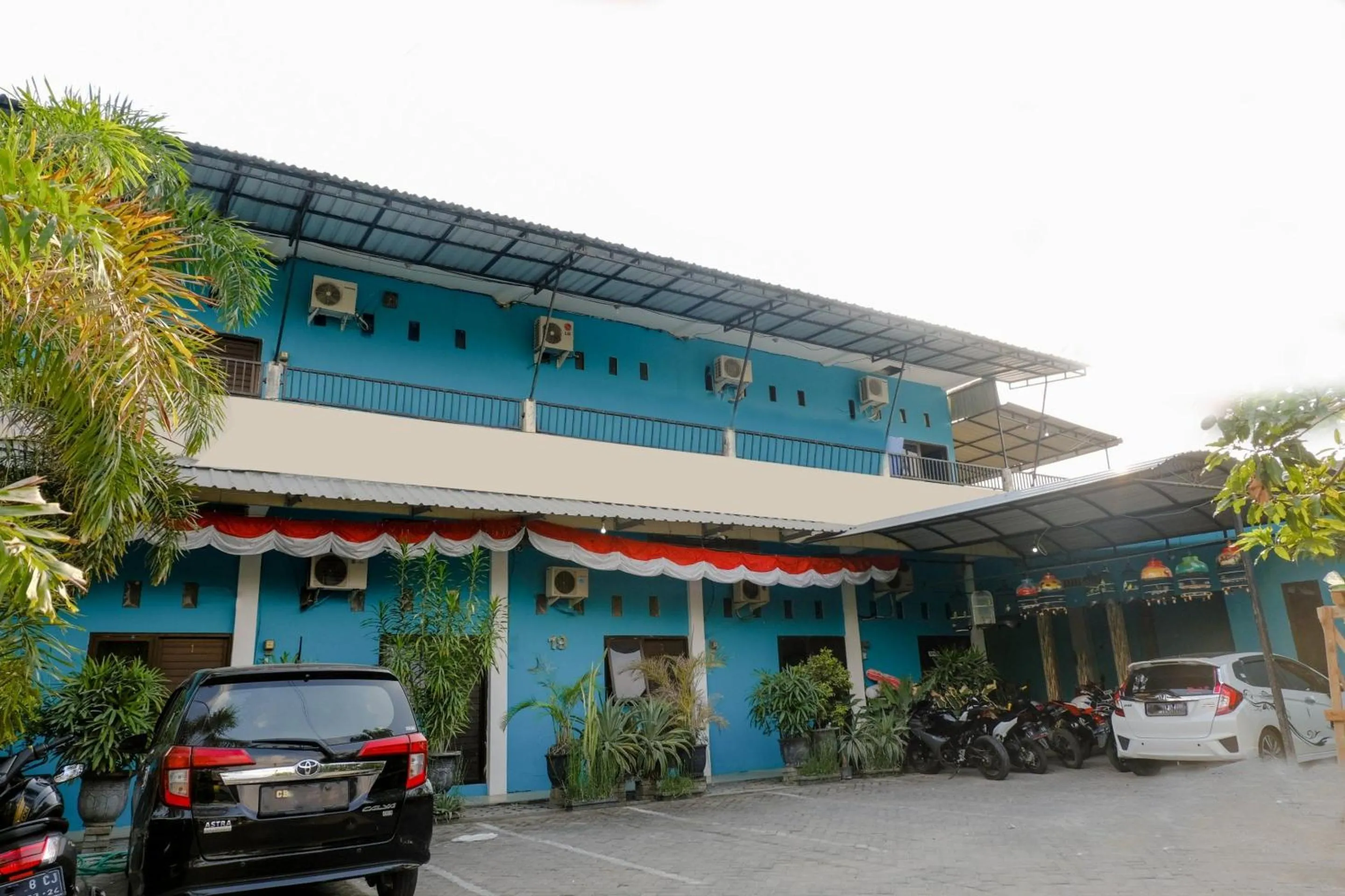 Facade/entrance in OYO 1784 Hj. Aniek Residence