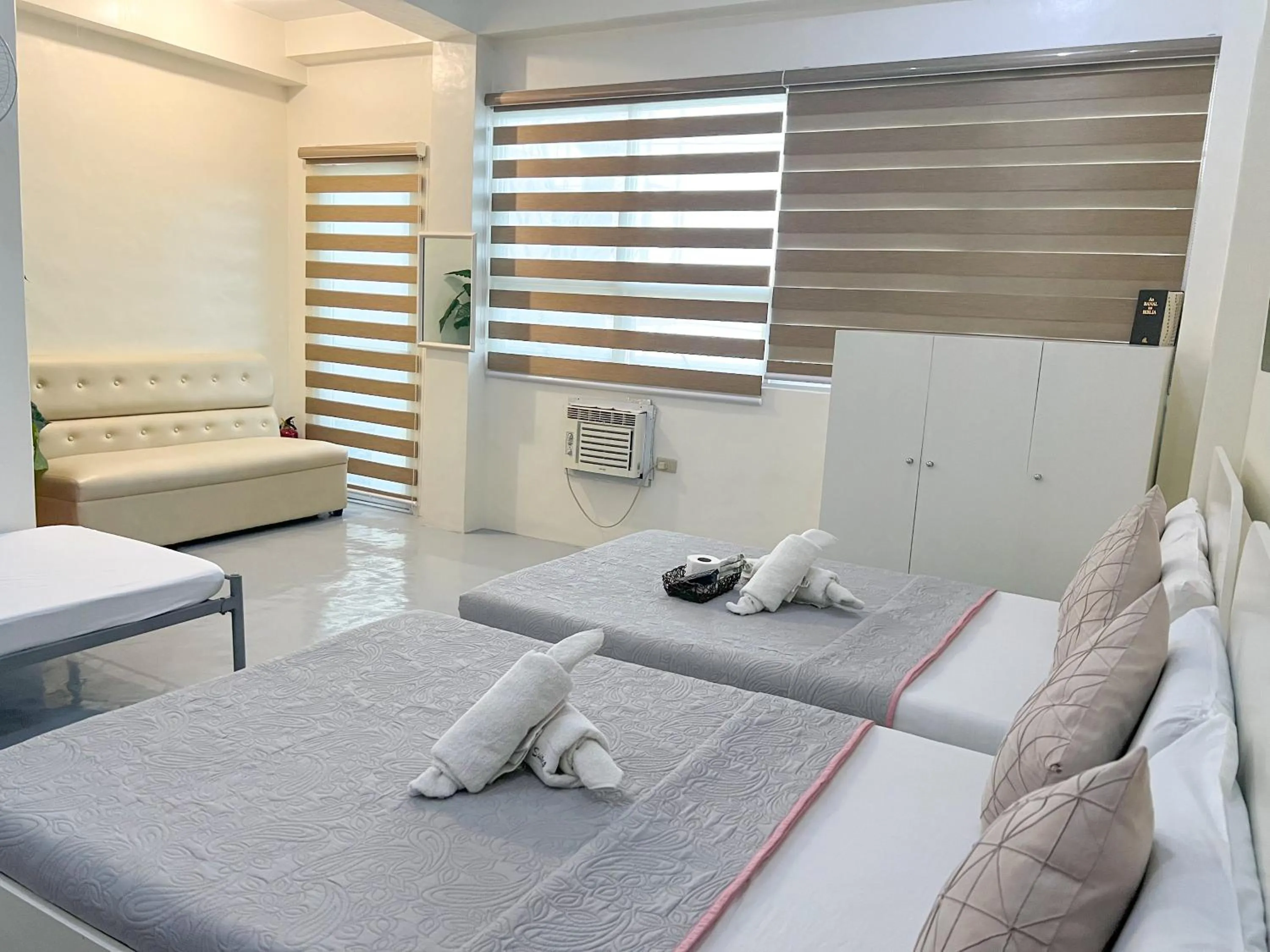 Bed in Casa Bicolandia Suites