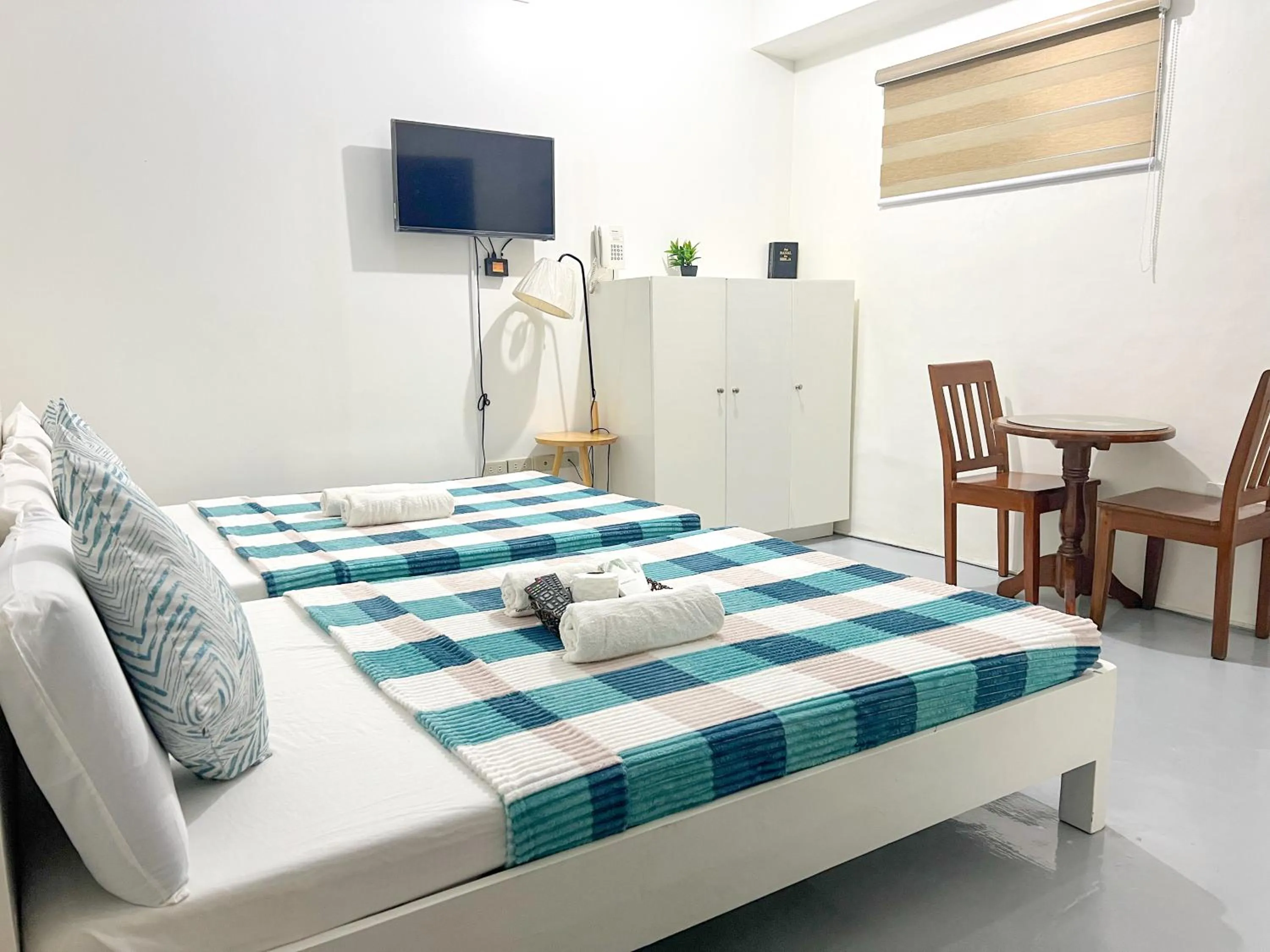 Bed in Casa Bicolandia Suites