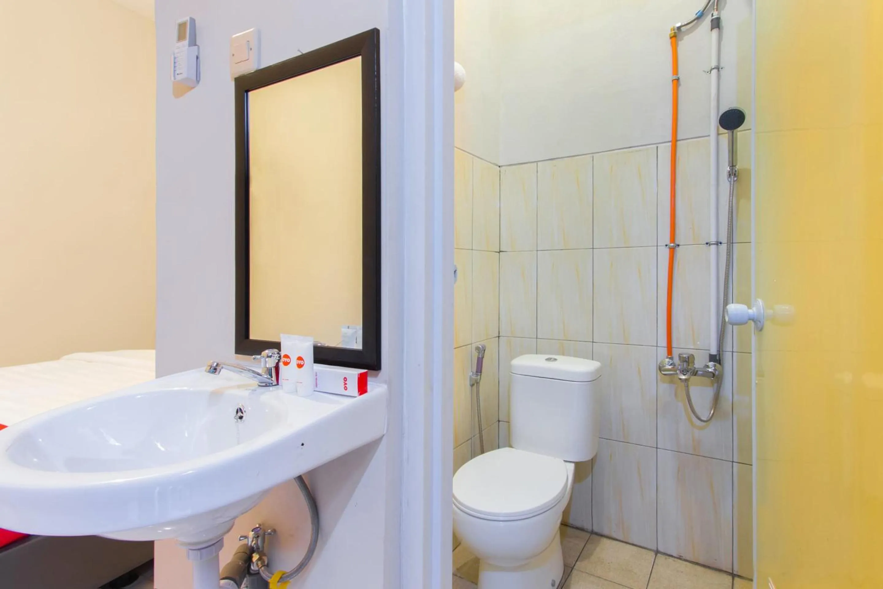 Bathroom in Hotel O Homestay Wak Gobenk