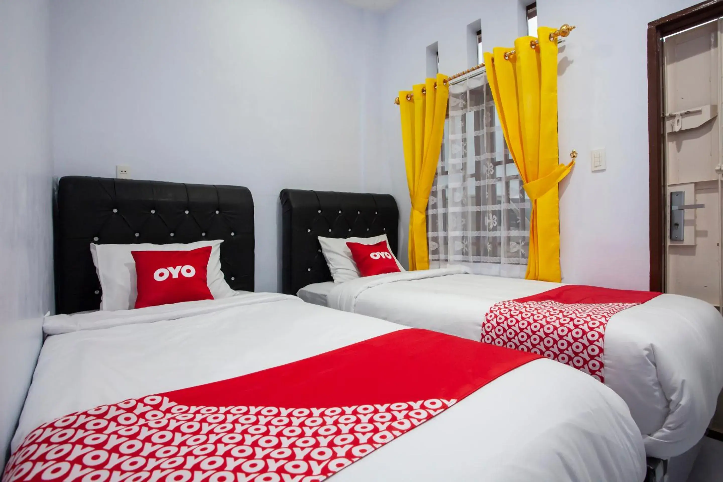 Standard Twin Room in OYO 1764 Sopou Penginapan Rinal & Tuah Standard Twin Room in OYO 1764 Sopou Penginapan Rinal & Tuah